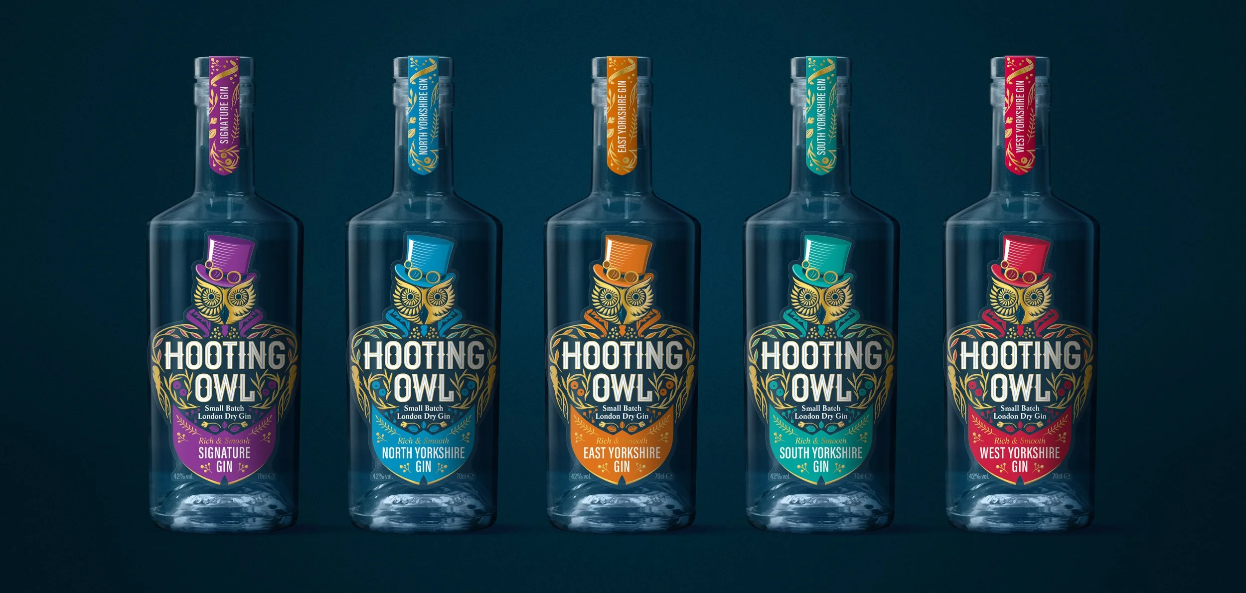 Five bottles of Hooting Owl Artisan Gin on a dark blue background.