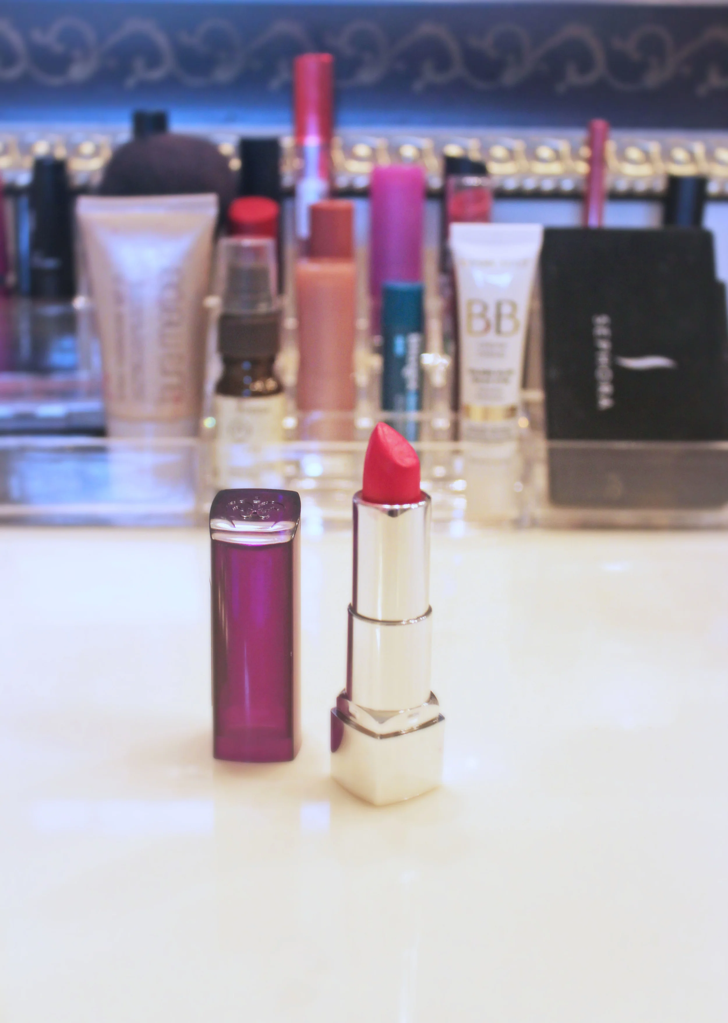 best fuschia: Rimmel London Moisture Renew Lipstick,550 "Back To The Fuchsia" I wore this lipstick in my last "Friyay" post; I really love how bright and bold it is. If you want to make a statement while still keeping it girly, this is your shade!