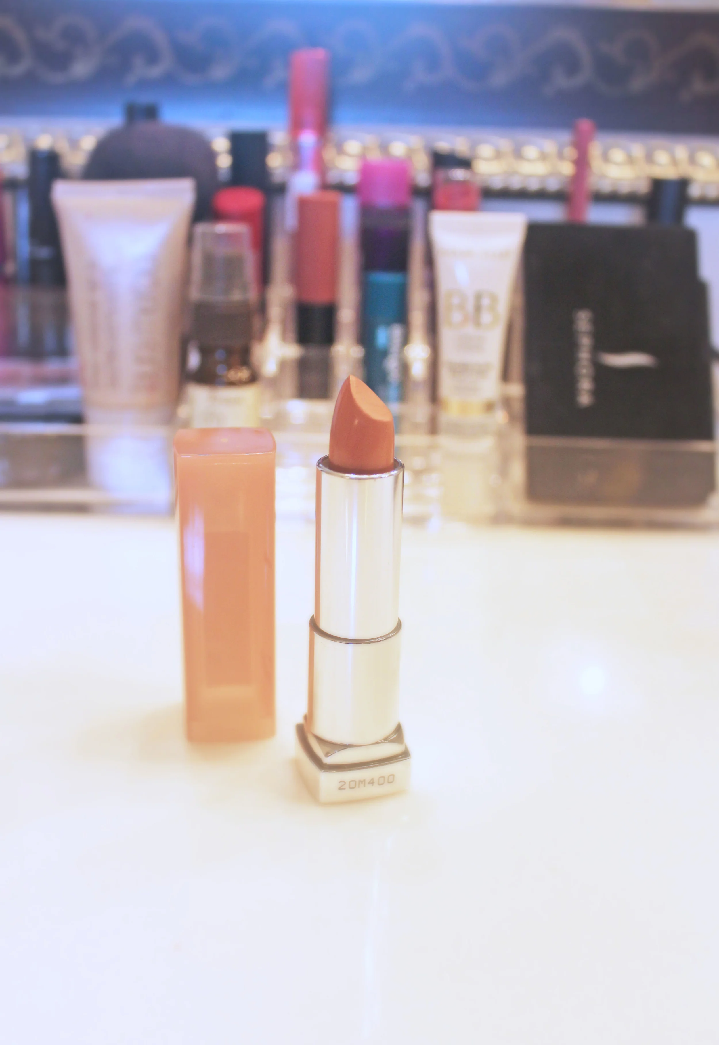 best nude: Maybelline New York Color Sensational The Buffs Lip Color, "Nude Lust" I really love this shade of nude because it blends in well with my lips, and has a very natural look. I don't like nudes that are too light as I feel they make my teeth look yellow (no-one wants that!). This is just the right color, not too light or not too dark, and it stays on for hours.