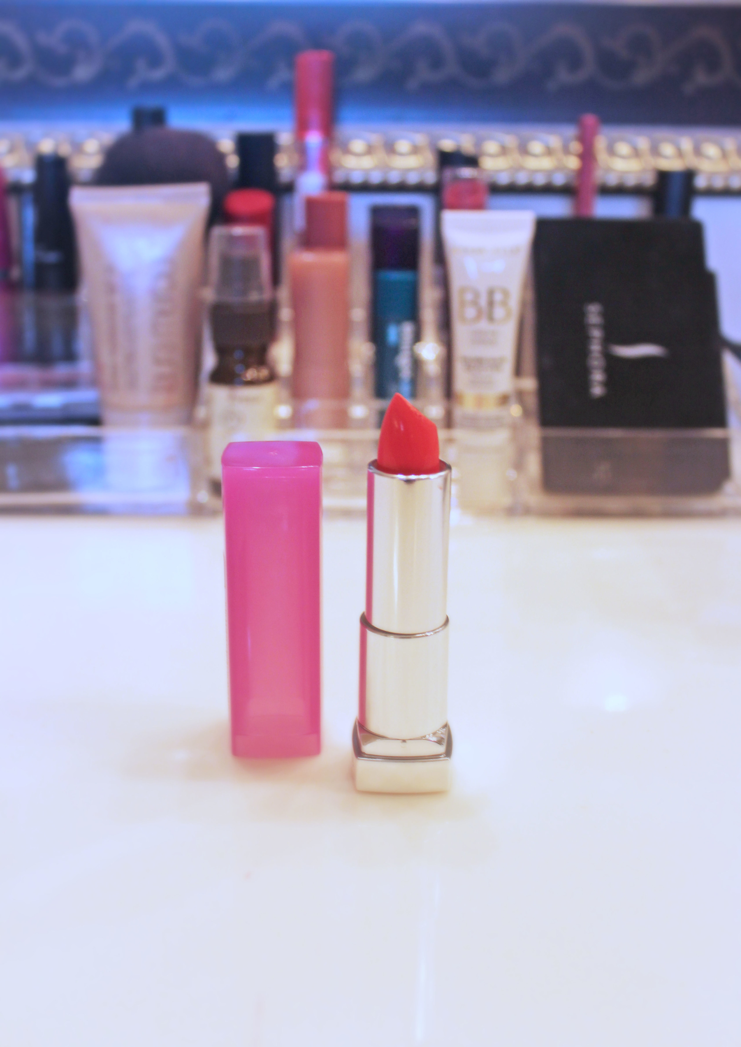 best summer coral: Maybelline Color Sensational Rebel Bloom in "Coral Burst" It took a really long time for me to get on board with coral lipstick; I used to never feel very comfortable in it. Now it's one of my favorite lipsticks for summer, and I think this Maybelline has just the right amount of punch to it. I also love how smoothly all the Color Sensational lipsticks seem to go on; no liner needed which is nice.