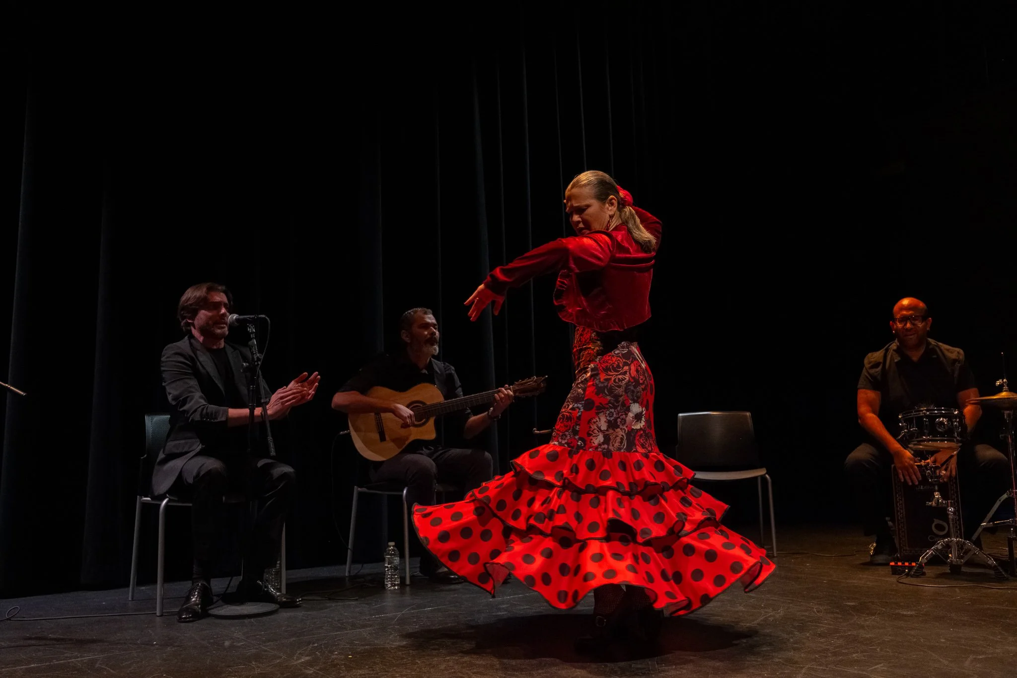  (From left to right) Flamenco cantaor “Cachito” Jose Diaz, guitarist Jose Manuel Alconchel, Wendy Clinard, and percussionist Diego Alvarez 