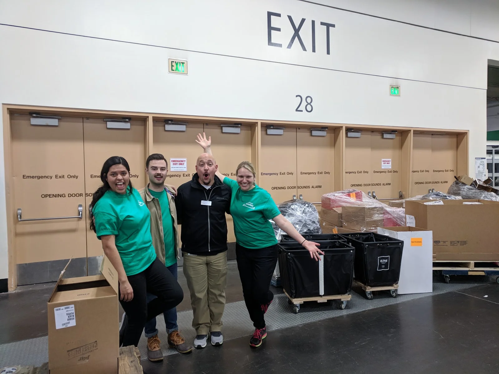 FRN National’s 2018 Winter Fancy Food Show Recovery Organizers (Paloma Sisneros-Lobato, Michael Boyd, and Annie Lobel, in green shirts) with the Director of Freight Operations at The Freeman Company (Louis Travieso, center) ecstatic to see the amount of incredible food being redirected from the landfill