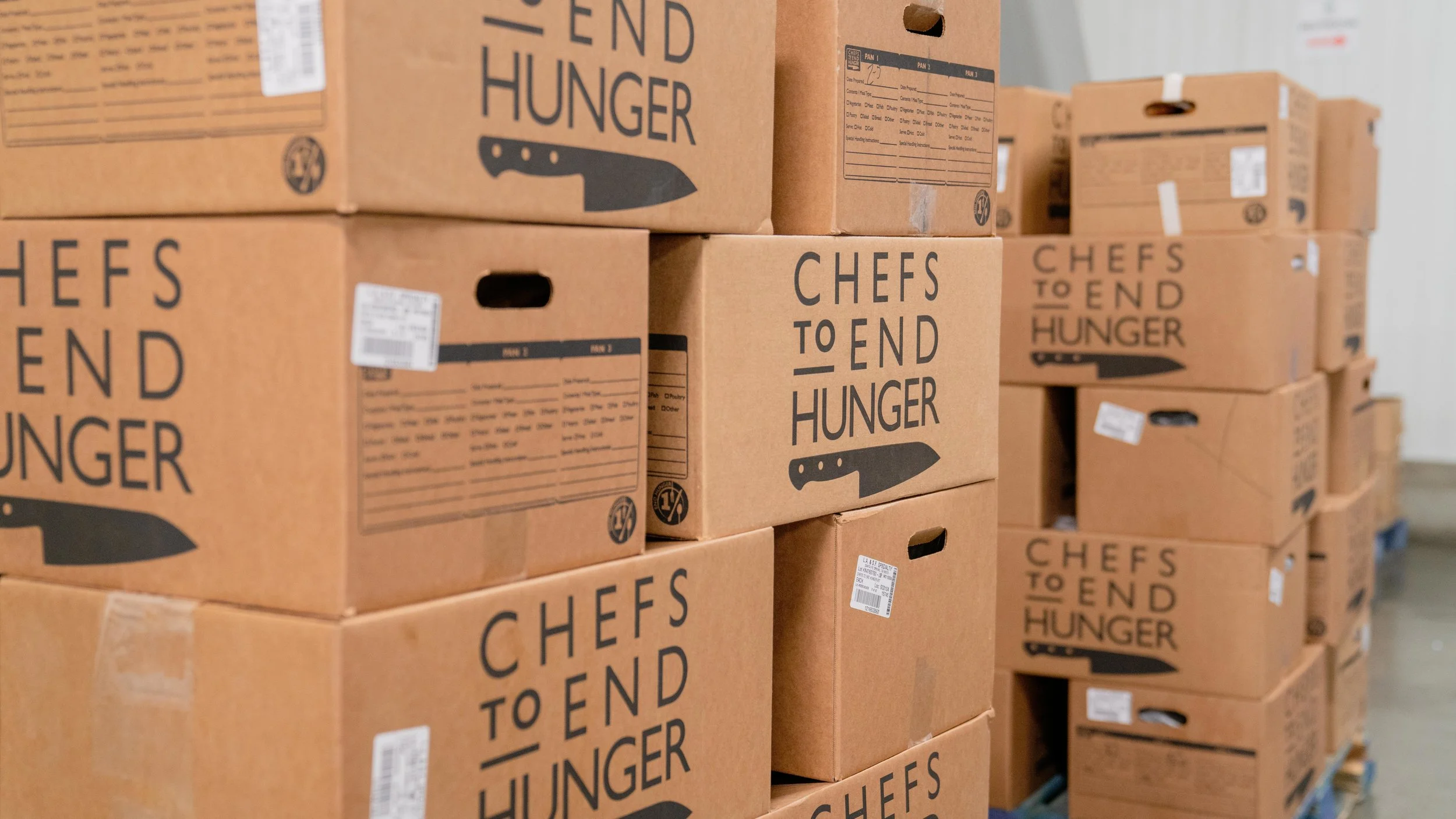 Just a taste of the thousands of Chefs to End Hunger boxes you’ll find in one of their warehouses.