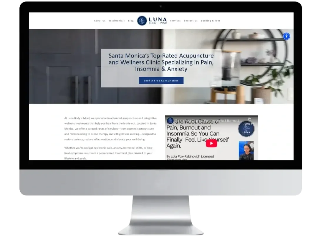 Mockup preview of the Luna Body and Mind WordPress acupuncture website featuring a clean, elegant navy design with clear navigation and modern layout.