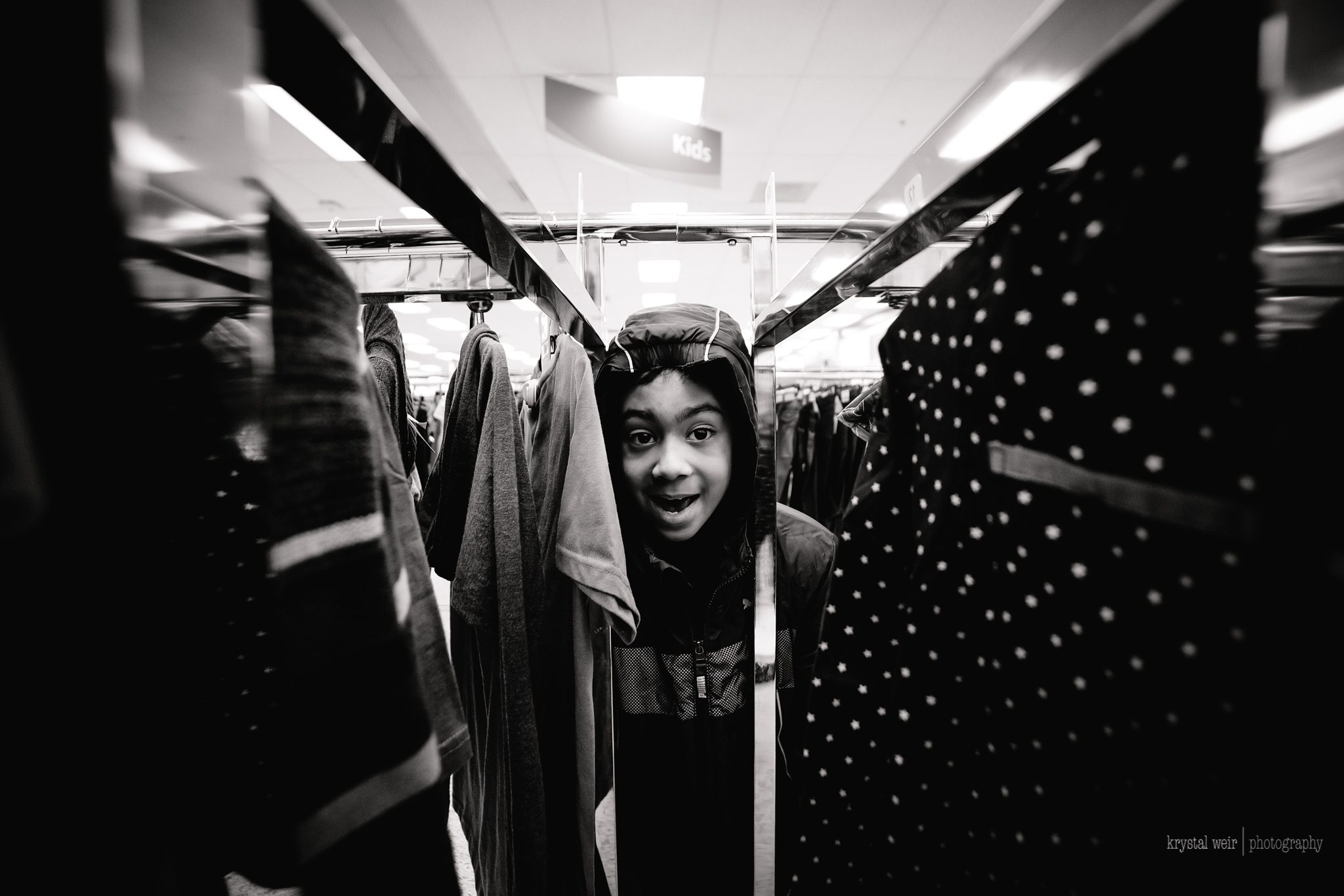 Day 6: Anyone else's kids act like they have no home training and play in the clothing racks!? Every time it never fails...lol! This day we played hooky from school. We went coat shopping instead, so random. My thought was, they had a 2 hour delay and it was Friday, that's all. I had to capture this because this is what happens every time we go to a clothing store, both of them play in the clothes racks. I do stop it, but that doesn't stop them from doing it again the next time.
Normal
0
false
false
false
EN-US
JA
X-NONE
/* Style Definitions */
table.MsoNormalTable
{mso-style-name:"Table Normal";
mso-tstyle-rowband-size:0;
mso-tstyle-colband-size:0;
mso-style-noshow:yes;
mso-style-priority:99;
mso-style-parent:"";
mso-padding-alt:0in 5.4pt 0in 5.4pt;
mso-para-margin:0in;
mso-para-margin-bottom:.0001pt;
mso-pagination:widow-orphan;
font-size:12.0pt;
font-family:Cambria;
mso-ascii-font-family:Cambria;
mso-ascii-theme-font:minor-latin;
mso-hansi-font-family:Cambria;
mso-hansi-theme-font:minor-latin;}
This photo was taken with a wide focal length. I love shooting wide because there is a uniqueness that it can bring to a photo