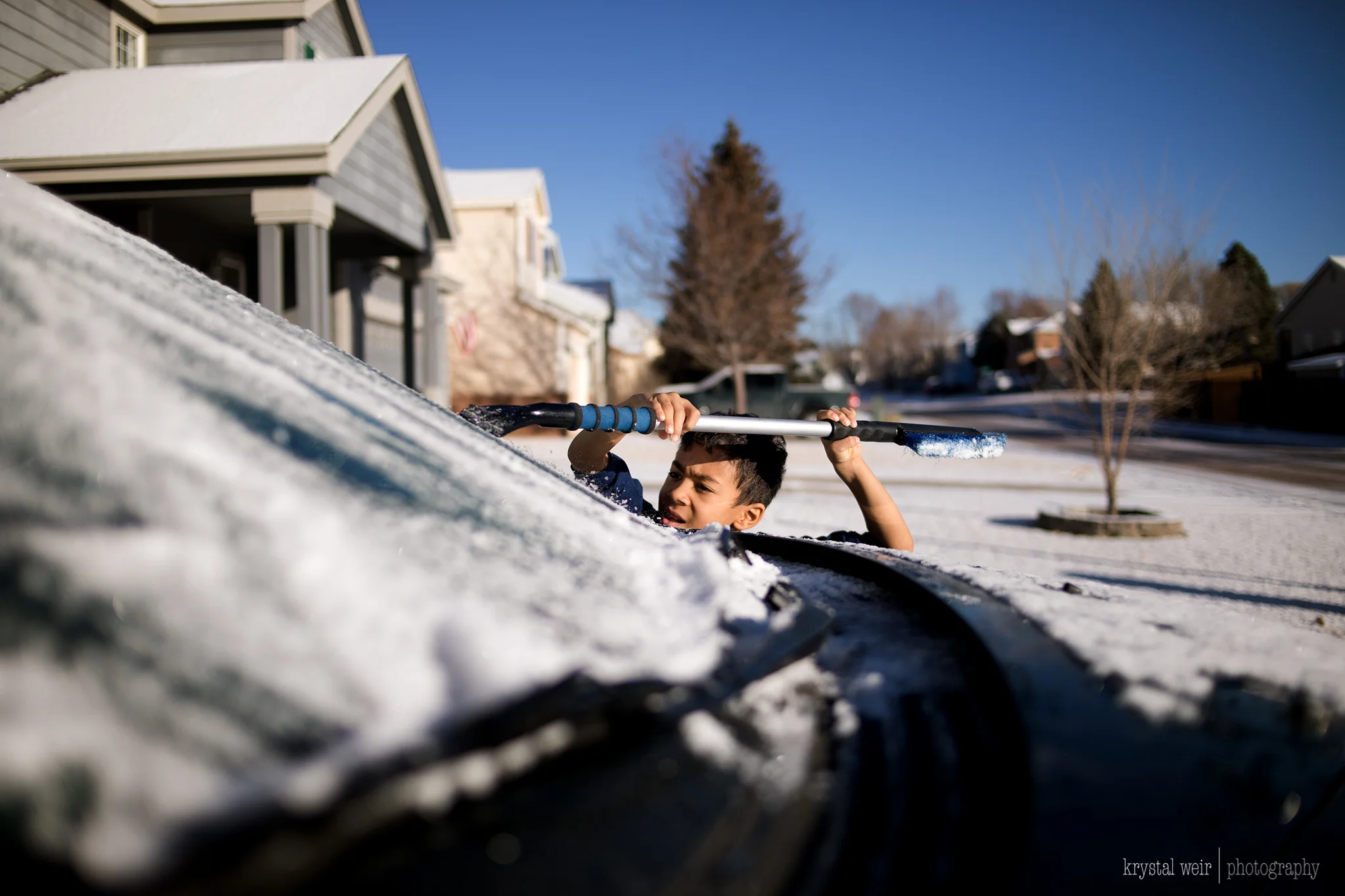 Day 27/365 I didn't even have to ask! I walked outside and he was scraping away. Such a little man. ❤️He surprised me with this act. I had to run back in to grab my camera to capture this of course. I shot at this perspective so that you could see h…