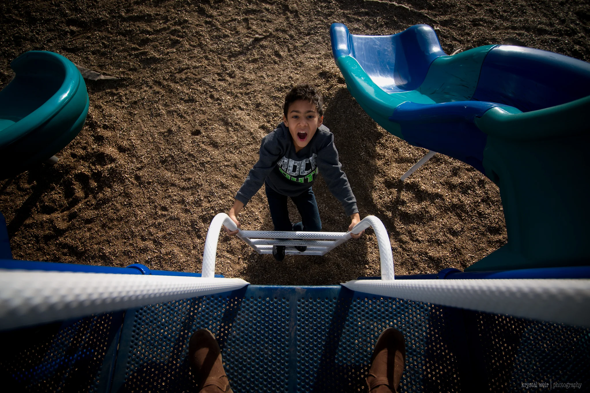 Day 31/365 Gotcha! Another game of photo tag! This year I'm wanting to post more photos of this kid because he's usually at school so I don't get as many of his cute face in my feed! I used my wide angle lens for this image and was able to include a lot in the scene including myself. Shooting from above your subject can add a different and fun perspective. 
