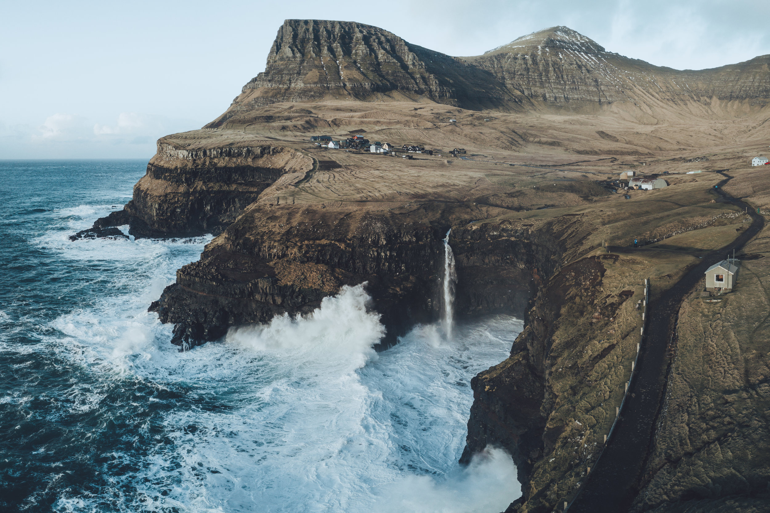  Heavy waves crashing into the cliffs at Gasadalur 