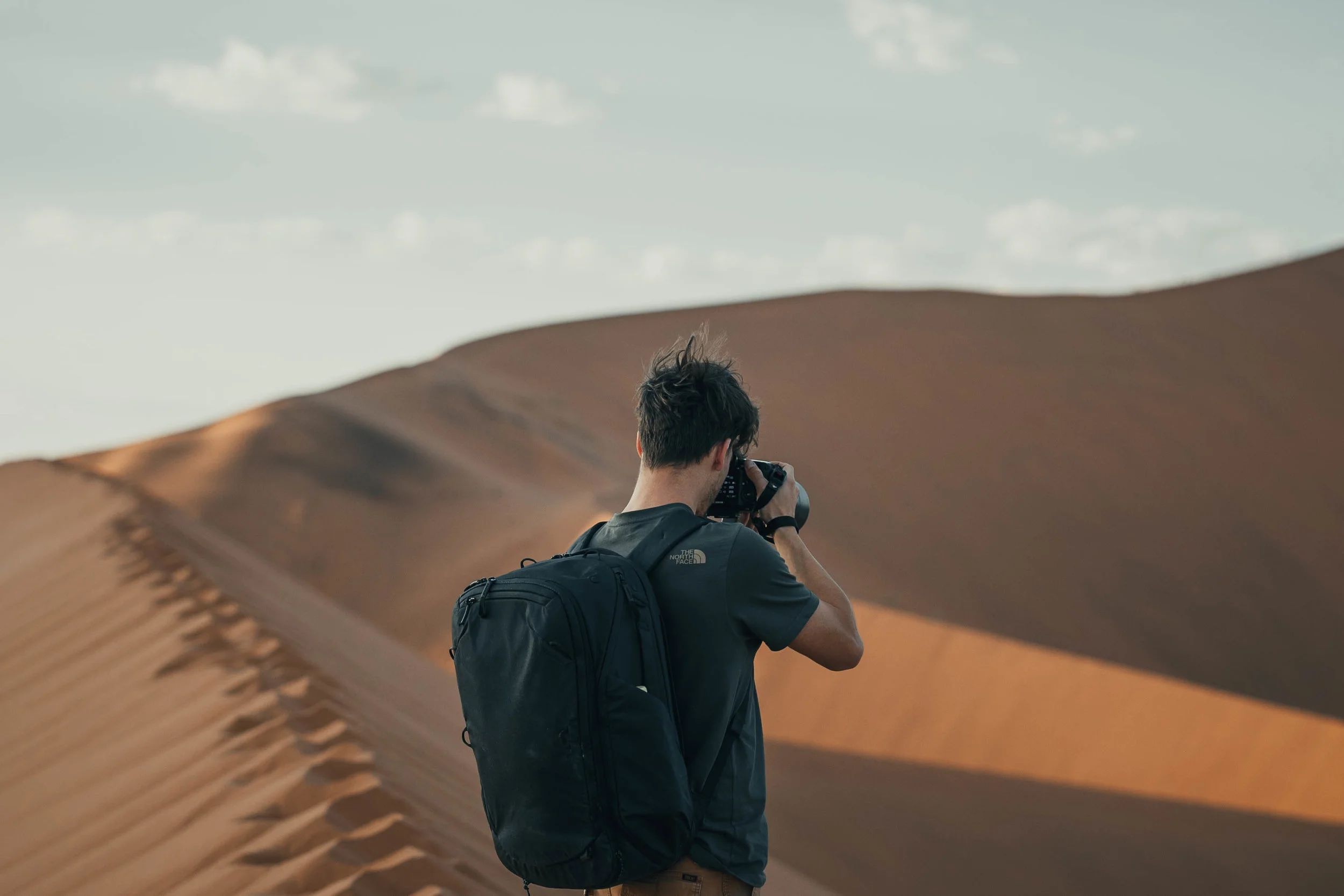 Capturing the beautiful Namibian desert with my trusty backpack