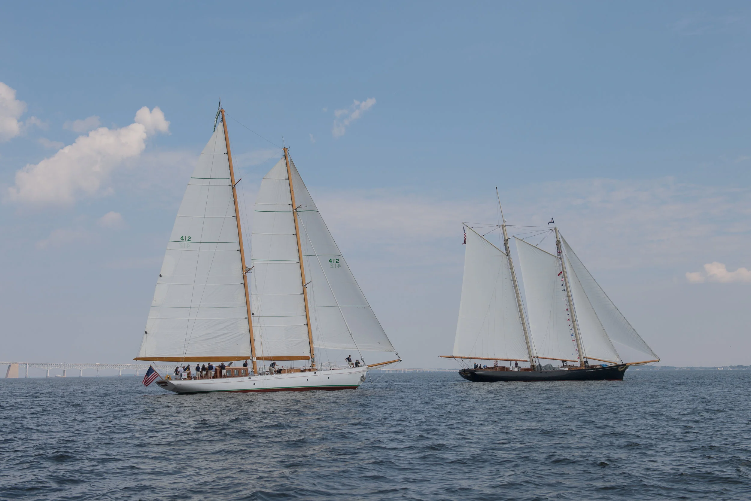 The 1929 John G Alden schooner Summerwind escorts the replica 1851 schooner America into Annapolis harbor.