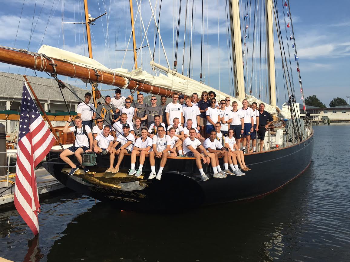 Members of the Sailing Team onboard America in the Naval Academy's Santee Basin.
