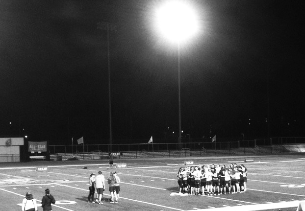 All-Stars and Nightlock post game huddle. 