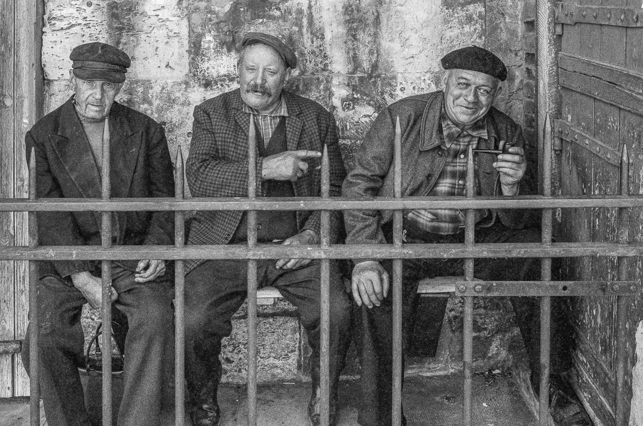 Three French Fishermen Sharing an In-Joke