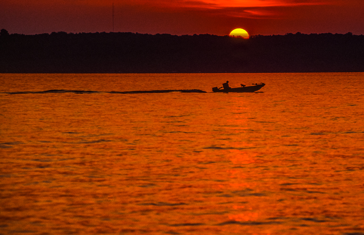 Lone Fisherman Heads Home At Sunset, Green Lake, Wisconsin