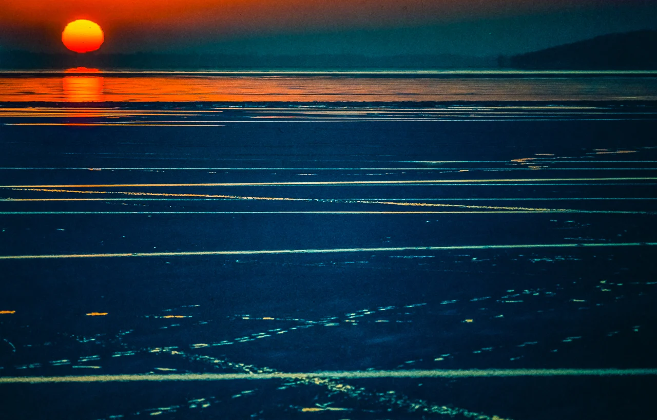 Green Lake Sunset Reflection With Blue Thawing Ice