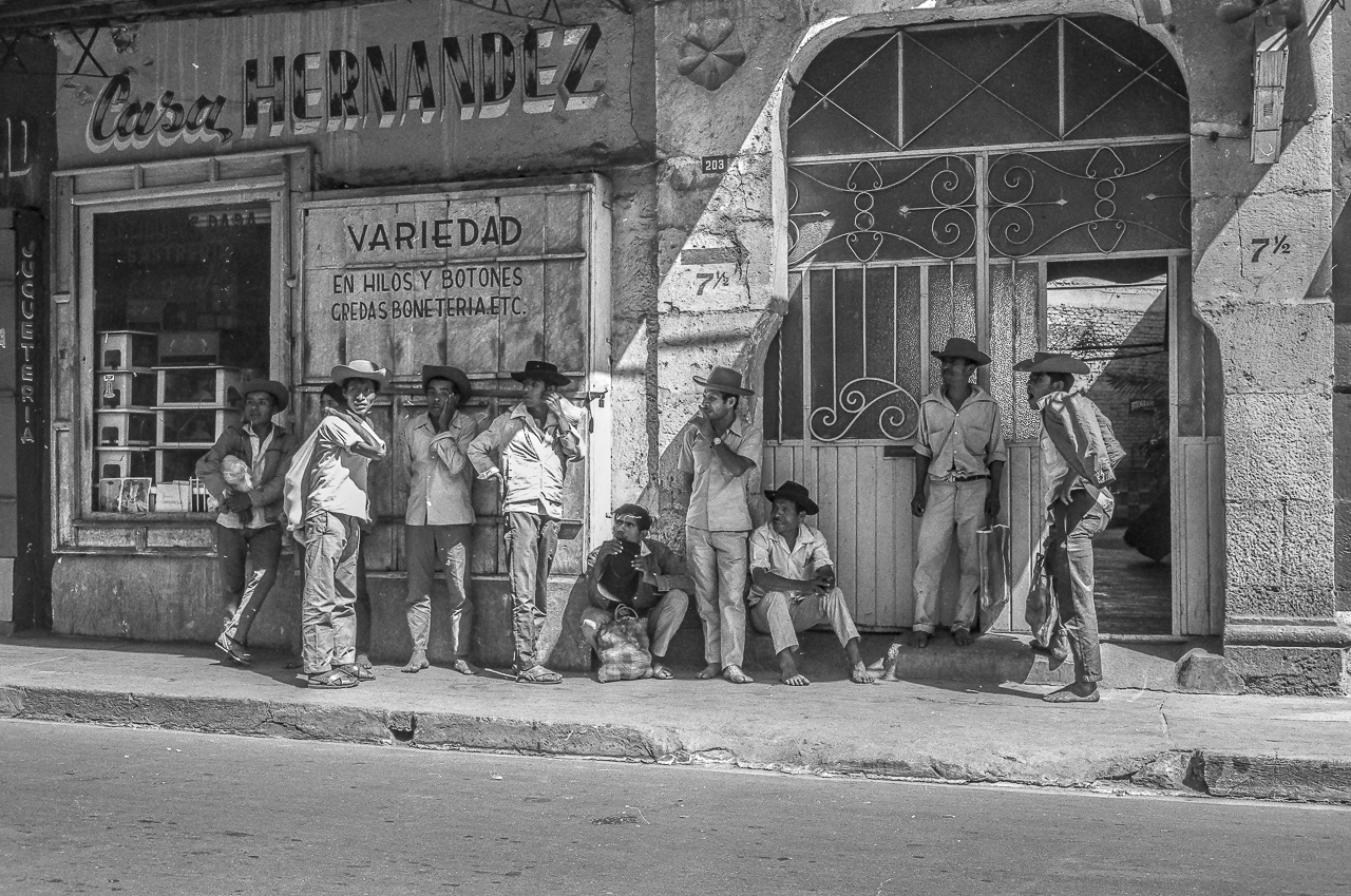 Nine Young Men Wait For Day Labor