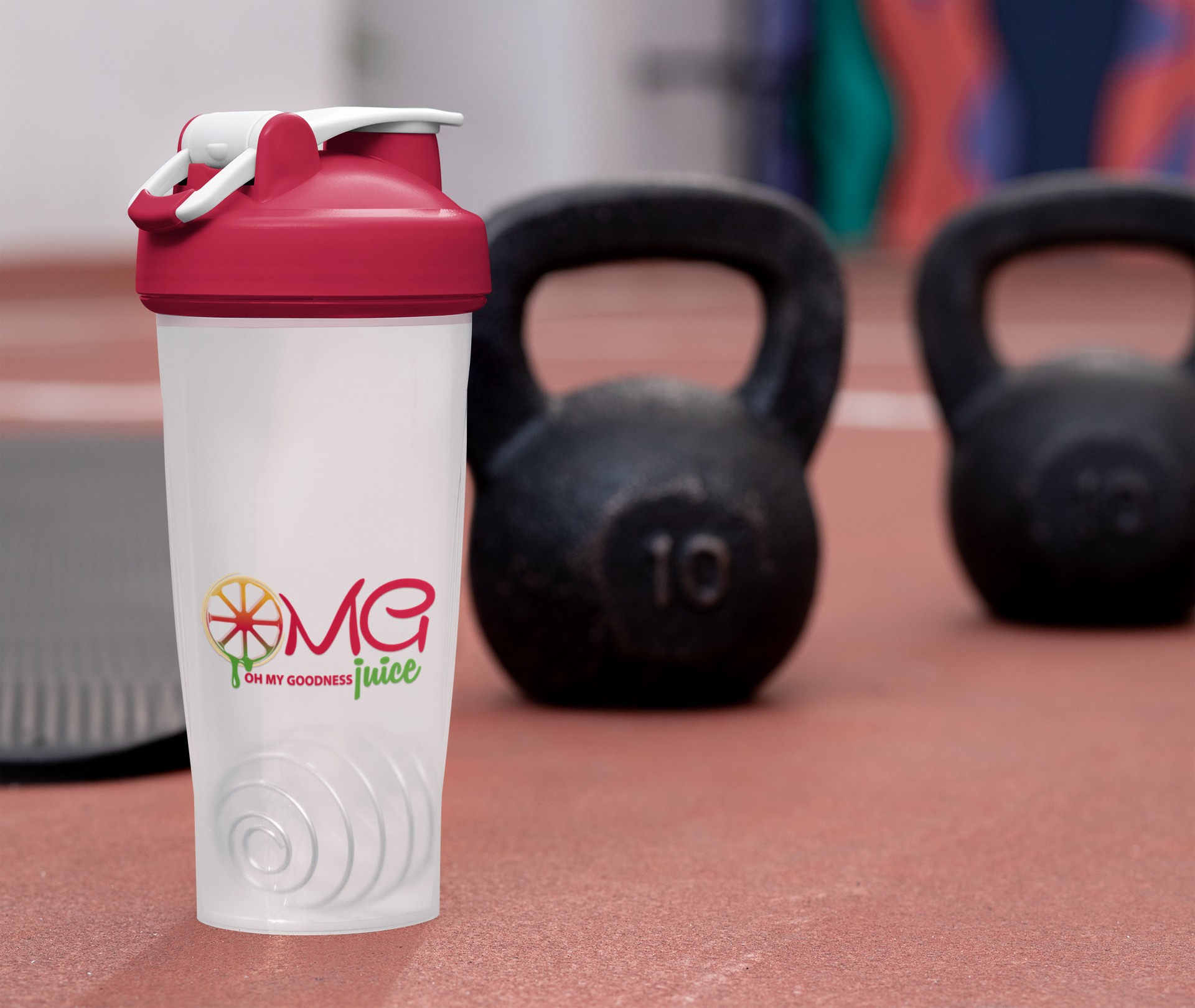 blender-bottle-mockup-with-some-kettlebells-in-the-background-33677.png