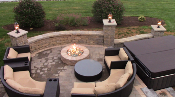 Patios A patio is a great addition to any home. Aside from serving as an extended living space, it allows you to do things outdoors without compromising your privacy. Get these benefits with the help of Roanoke Landscapes. We have been building great patios in the state of Virginia for years. Each project we handle is built with functionality and durability in mind in order to optimize the benefits that this additional structure would provide. We believe that a patio is more than an extended structure of a house; it is a place for opportunities to gather and bond with family and friends. Why Patios are a Must-Have Feature Some people think that extending the living area outdoors is just a waste of time, money, and materials. Although patios will, indeed, require time, money, and materials to be built, they would definitely not go wasted. A patio is a great place for relaxation. After a hard day’s work, it would be nice to spend quiet time outdoors with a good book or, probably, with some mellow music. The patio could also be a wonderful place for entertaining guests. You could add some chairs and tables, as well as decorate it with plants or some fancy decor to give it a homier feel. Another benefit of adding a patio is that it increases the value of a home. The more features a home has, especially if each is built with excellence, the more valuable it would be in the market if ever you decide to sell it. Types of Patios and Patio Materials The type of patio depends on the kind of materials you plan to use. We only make use of the best and most durable materials when it comes to building patios. We have partnered with the most reliable providers of building materials so that we can offer our Virginia clients with vast options. Here are some of the most common types that we build: Brick Patio Natural Stone Patio Wooden Patio Concrete Patio Expert Patio Builder in Virginia At Roanoke Landscapes, we are determined to go beyond every client’s expectations. We ensure that the patios we design and build are durable and beautiful. We are proud to say that we are certified and member of the Interlocking Concrete Pavement Institute (ICPI) and the National Concrete Masonry Association (NCMA), which are proofs of our expertise and skill in building structures in your homes, including the construction of patios. Call us now or visit us on your most convenient time at our main office at Southwest Virginia. We are always ready for any patio project, whether it is in Buchanan, Covington, Lynchburg, or any other town in Virginia.