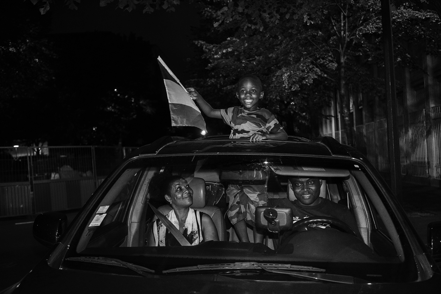 Paris_Street_2018_Young_Boy_waving_French_Flag-004BW.jpg