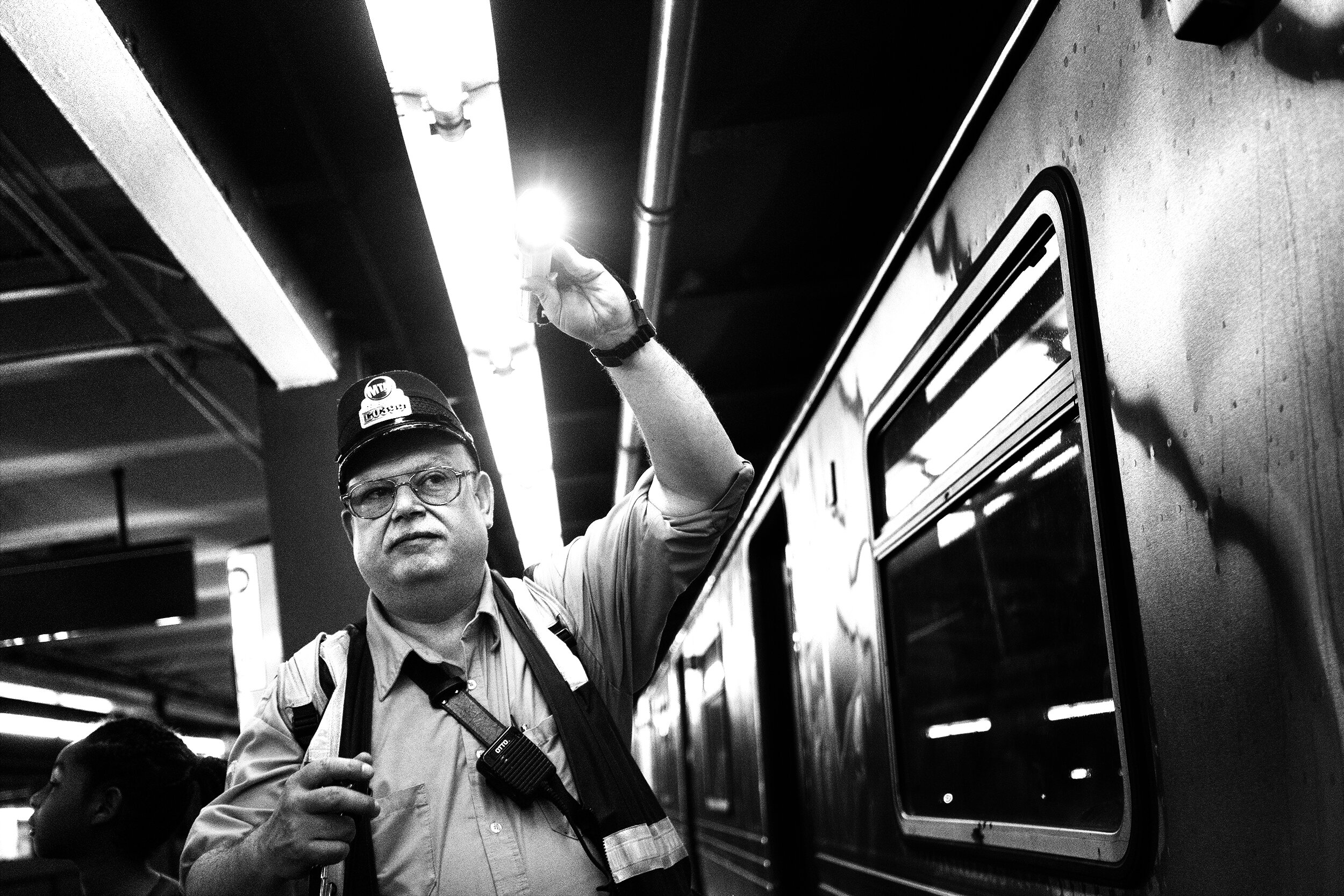 Brklyn_Subway_2018_Conductor_With_Flash_Light-009crp.jpg