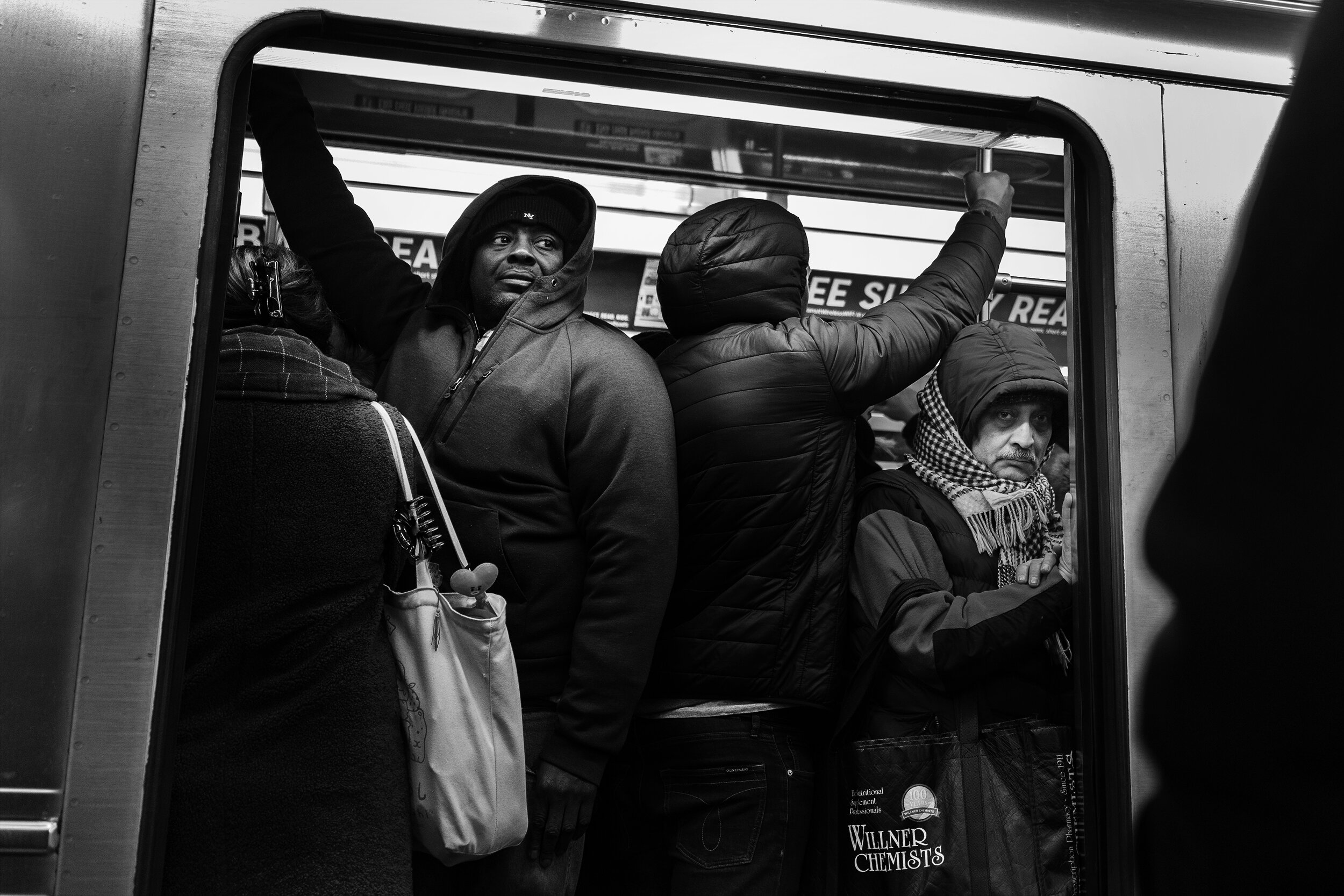 NYC_Subway_2019_Crowded_Men-011crp.jpg