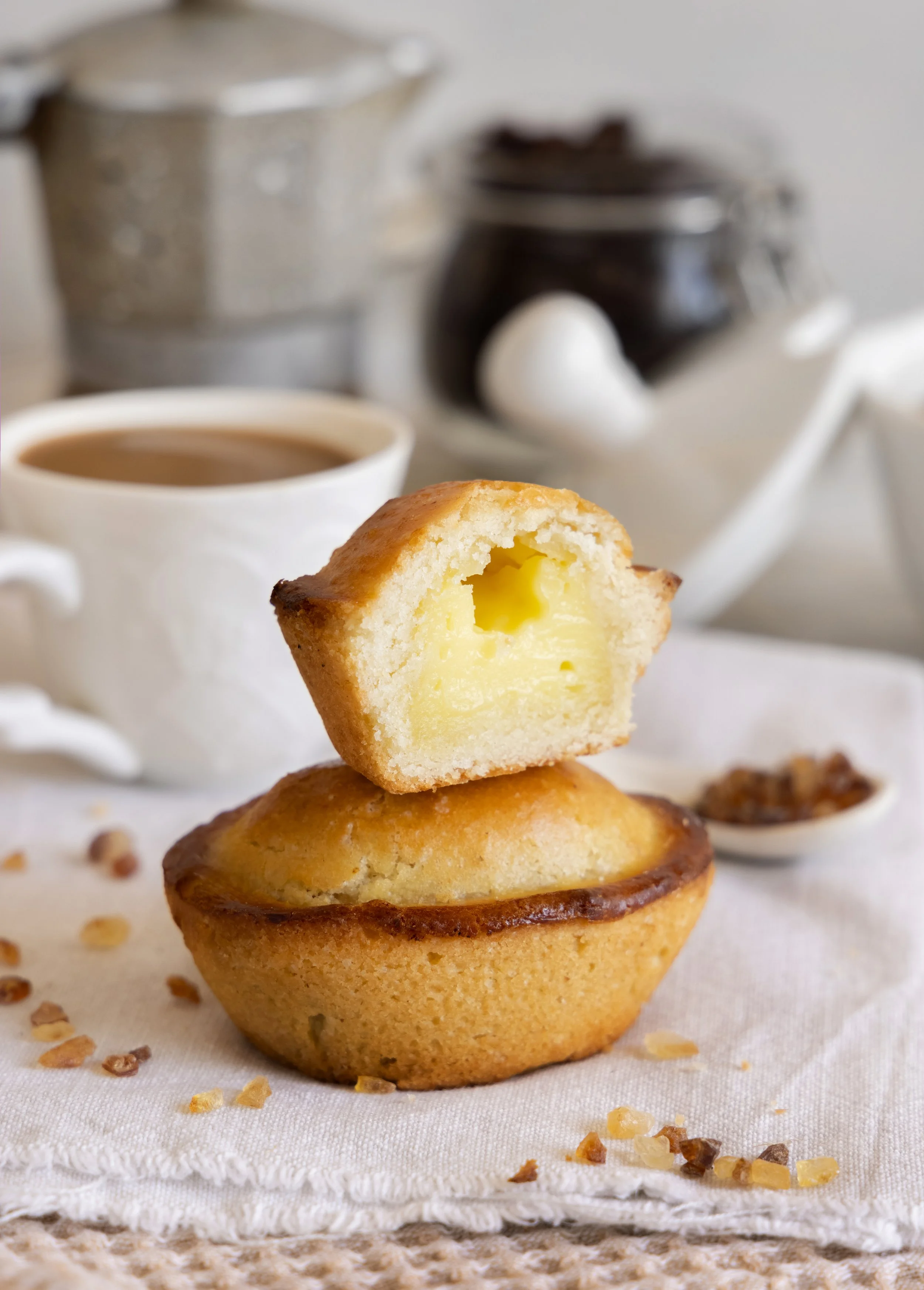 pasticciotto-leccese-pastry-filled-with-egg-custard-cream-typical-sweet-from-lecce-italy-pieces-pasticiotto-beige-napkin-apulian-breakfast-with-coffee-prepared-close-up.jpg