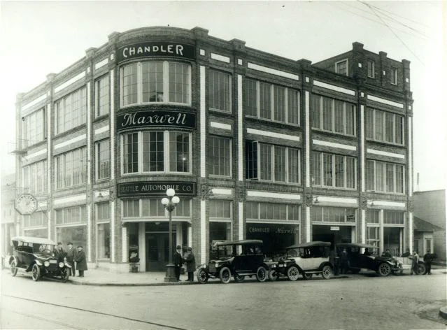 Historical photo of the Baker Linen Building, the current location of Retrofit Home on the corner of Pike Street and 11th Street.
