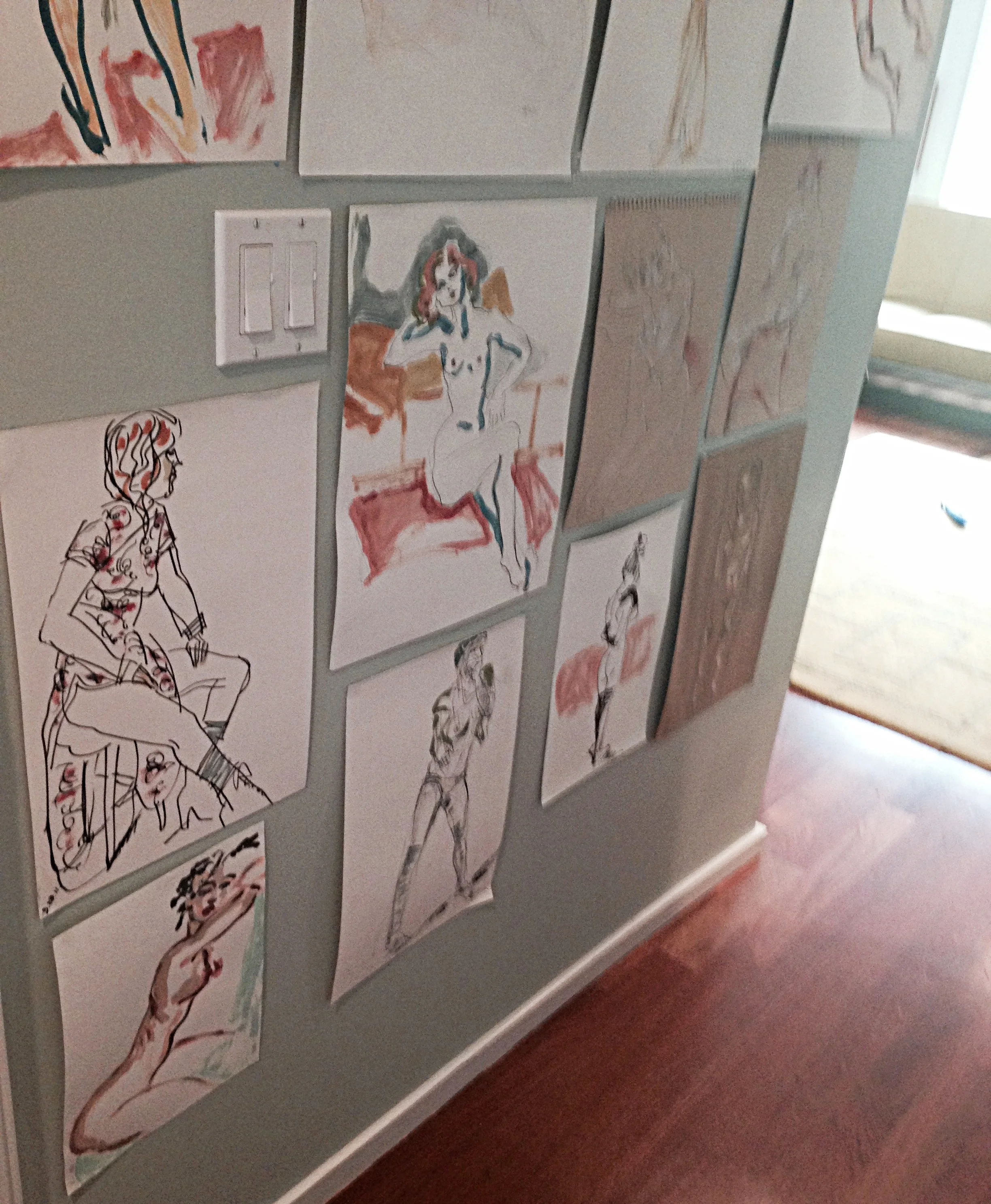 A wall of my pre-digital life drawings. Made the switch to the Apple iPad in 2013 and never looked back. Photo taken in my home studio.