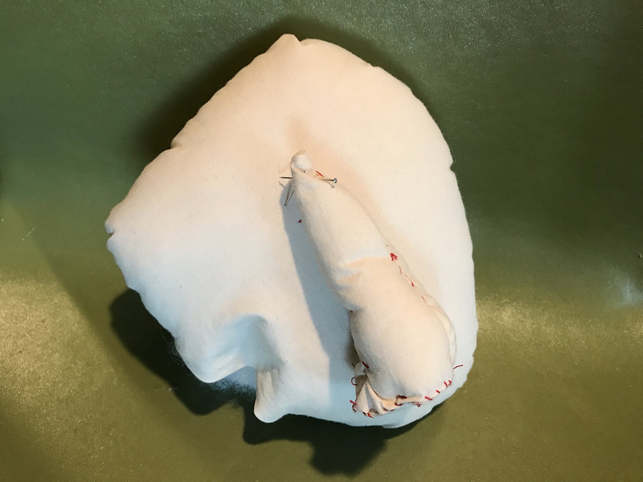 Learning sewing and stuffing techniques