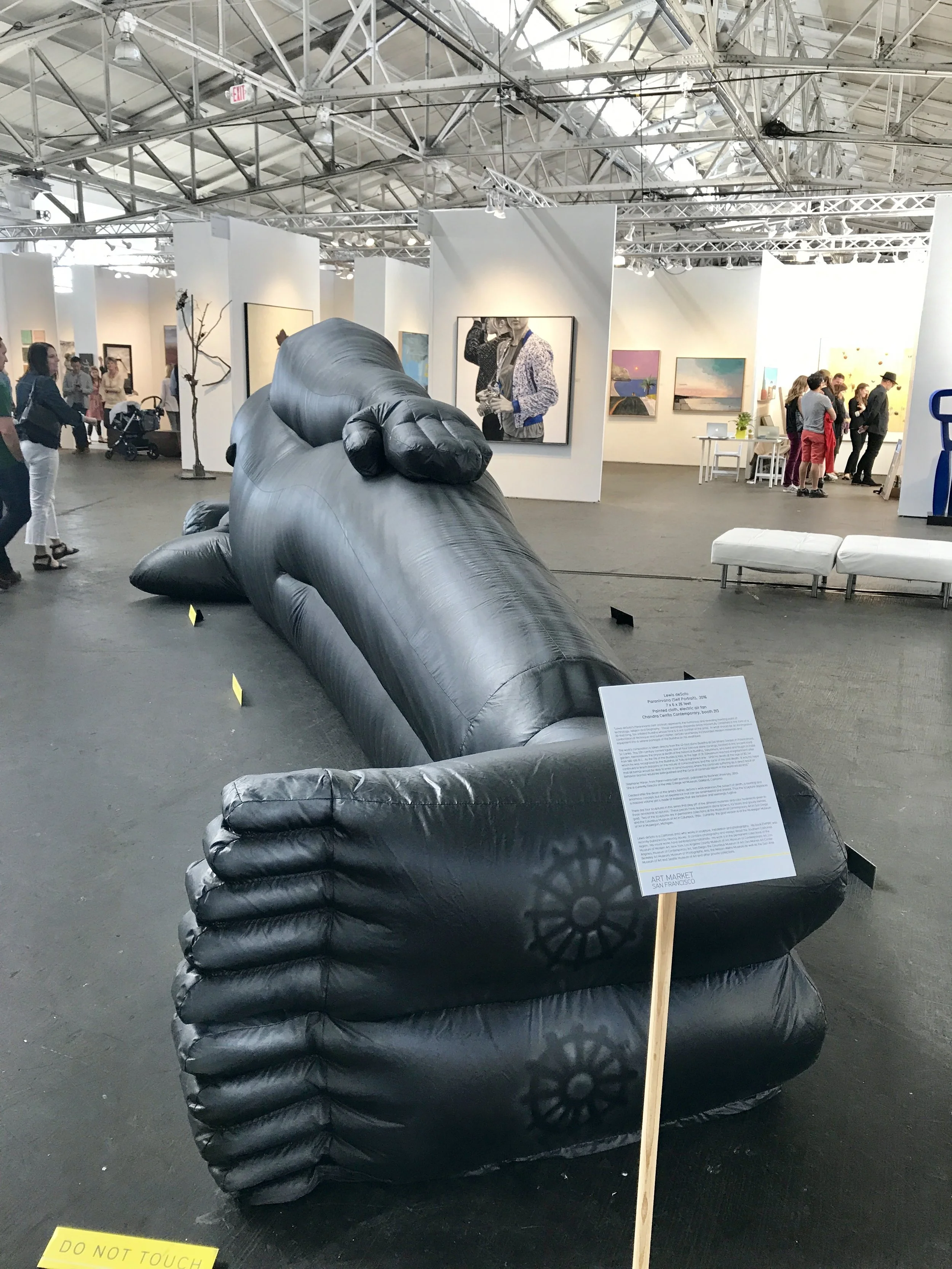 One of the larger works on display at Art Market SF reminds me of my recent trip to Burma! It's a blow-up version of a reclining Buddha.