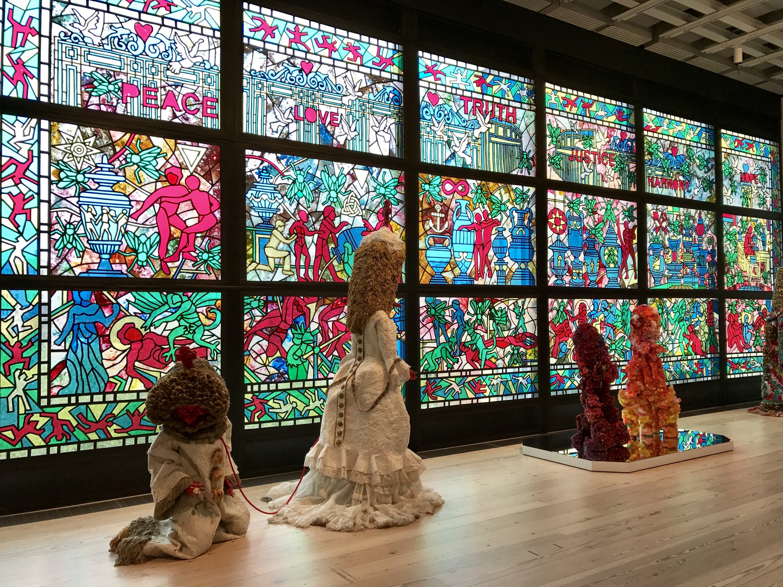A colorful room at the Biennial. Thinking about site- specific art like this faux stained glass.