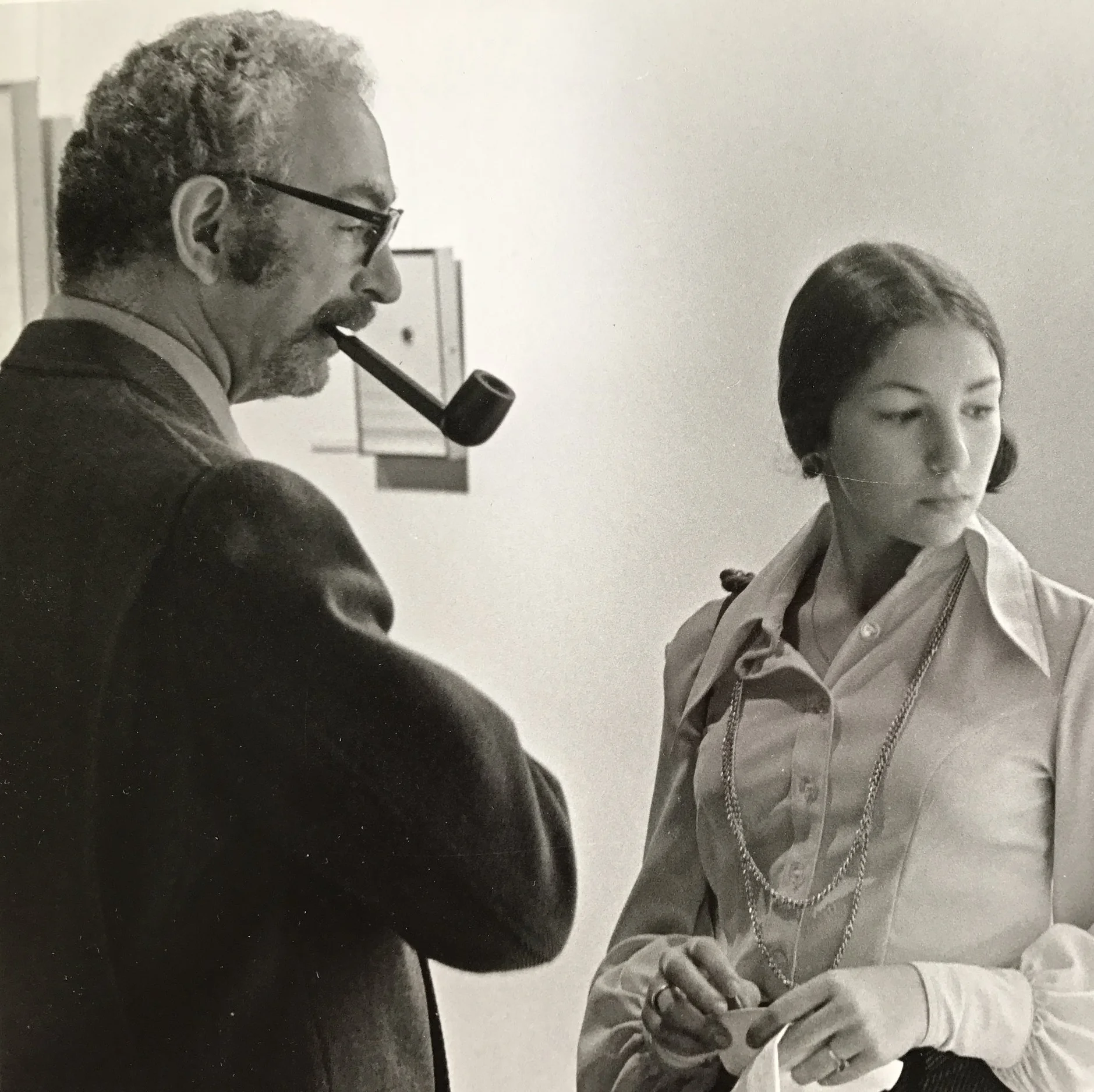 As a teenager with my father in our art school gallery.