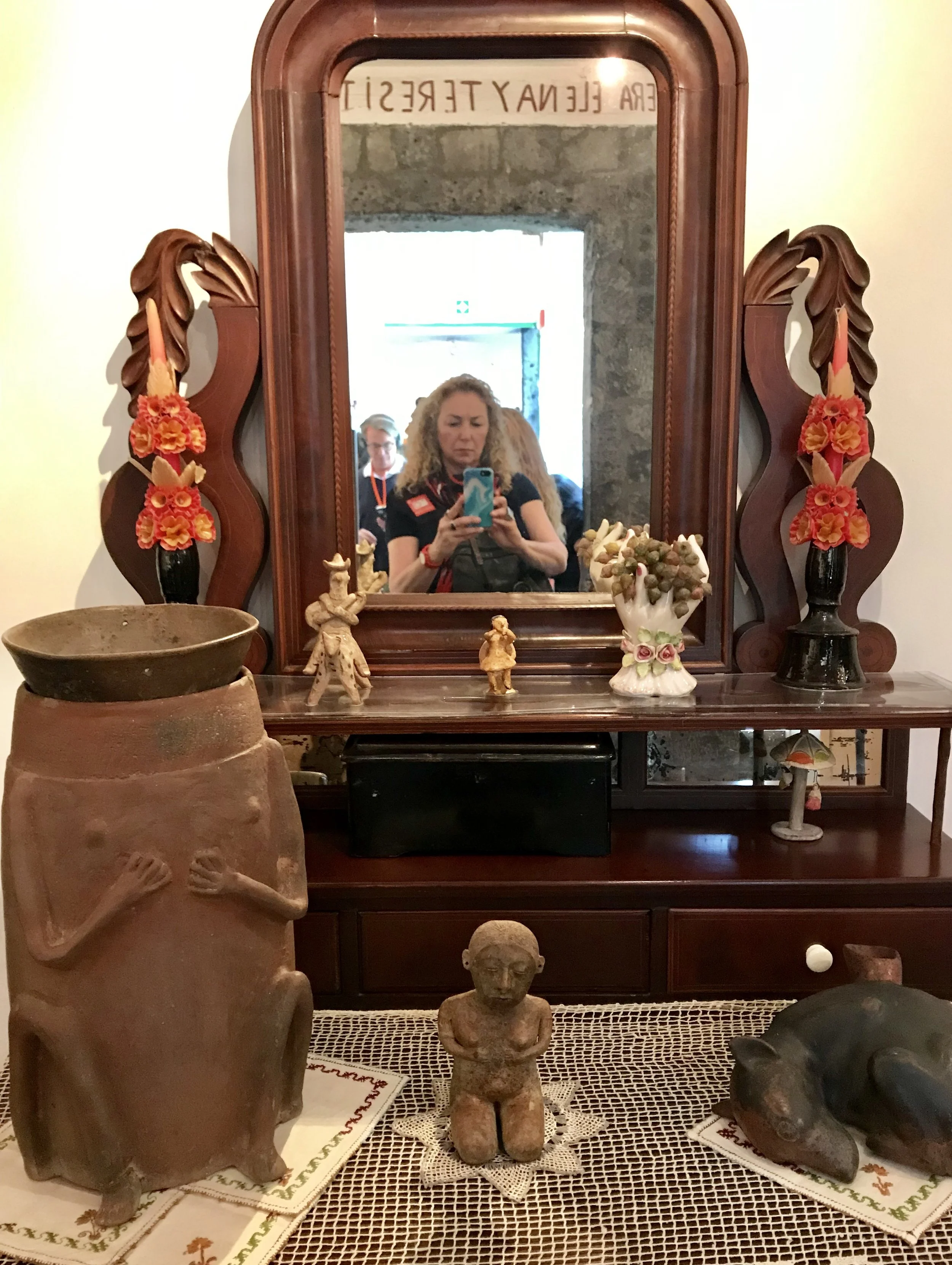 This is the urn (left) where her ashes are kept on display in her bedroom.