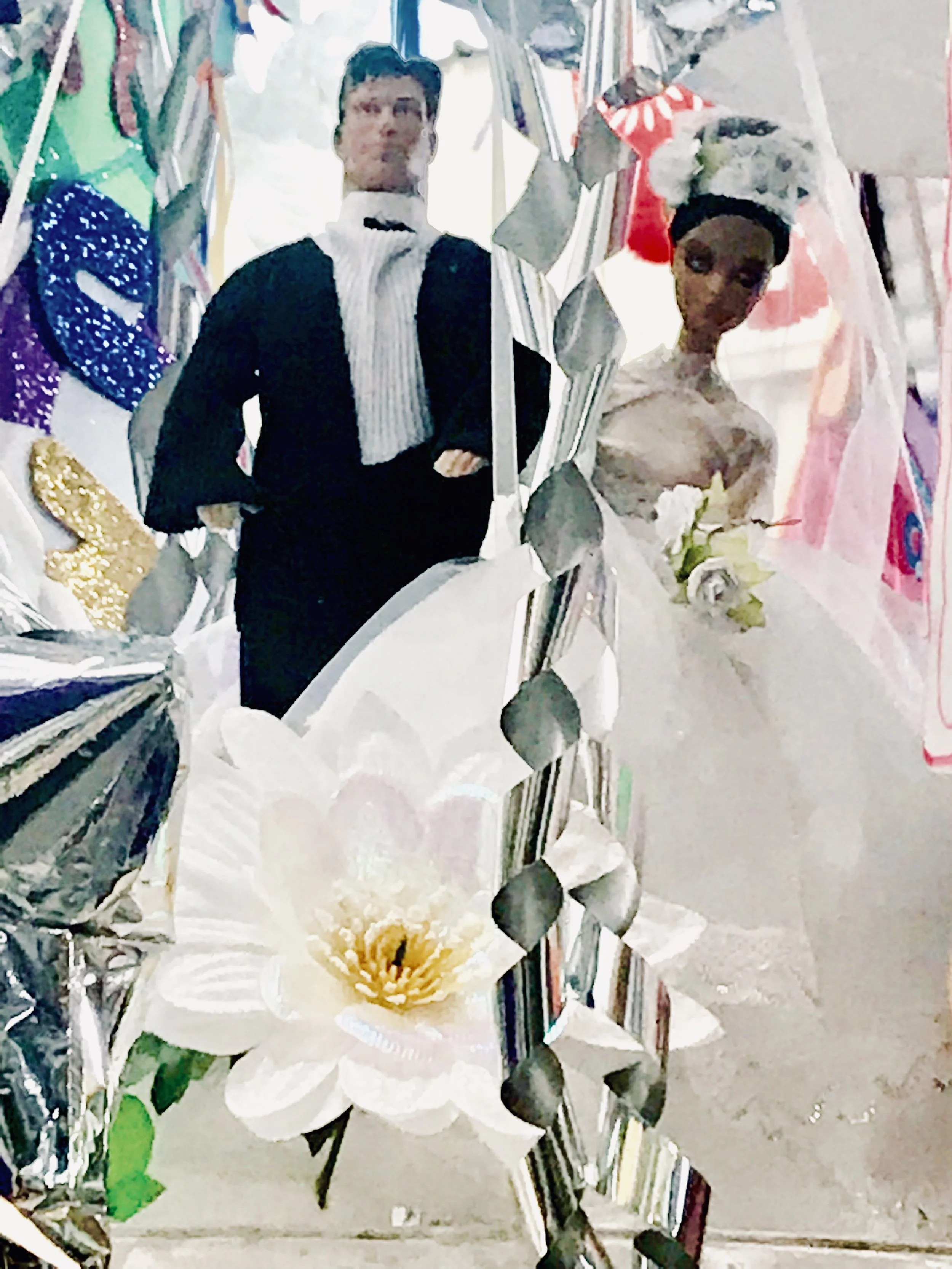 This image is from a market in Mexico - a wedding cake topper?