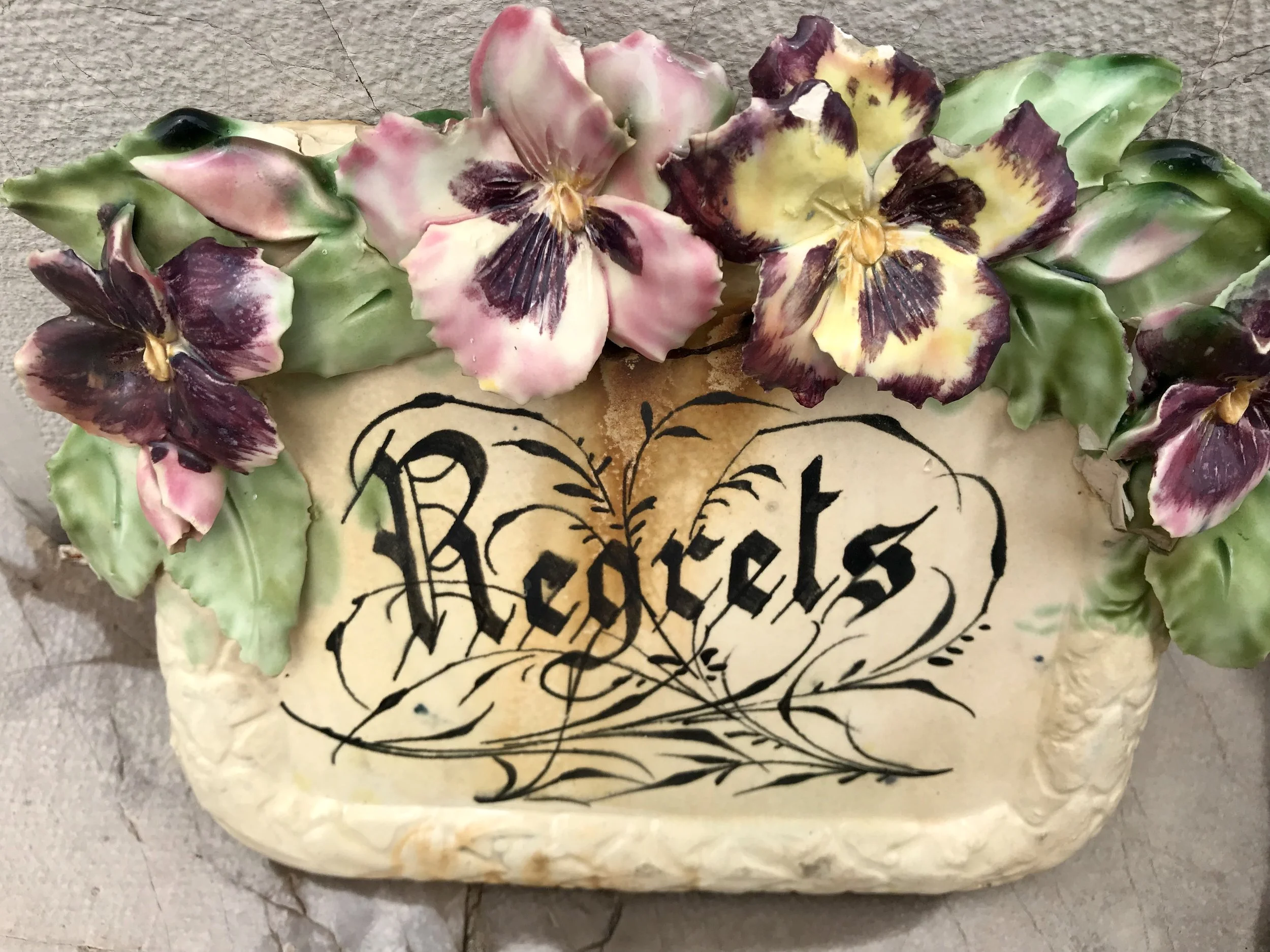 Delicate, colorful, porcelain flowers abound here.