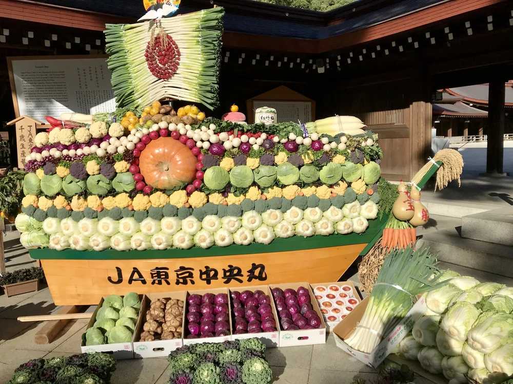 Temple festival being broken down for food distribution