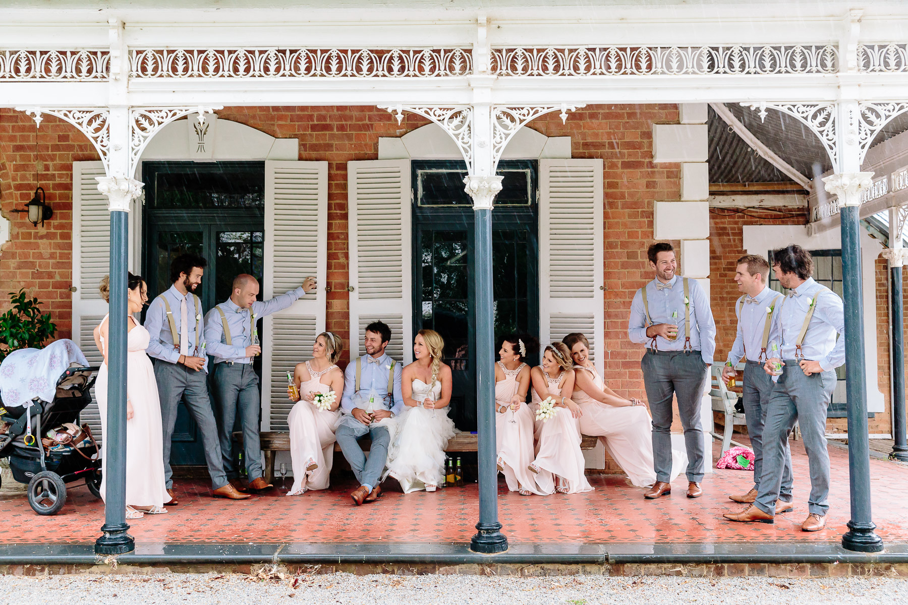 Bridal Party sheltering from the rain on the verandah of the homestead at Perricoota Station