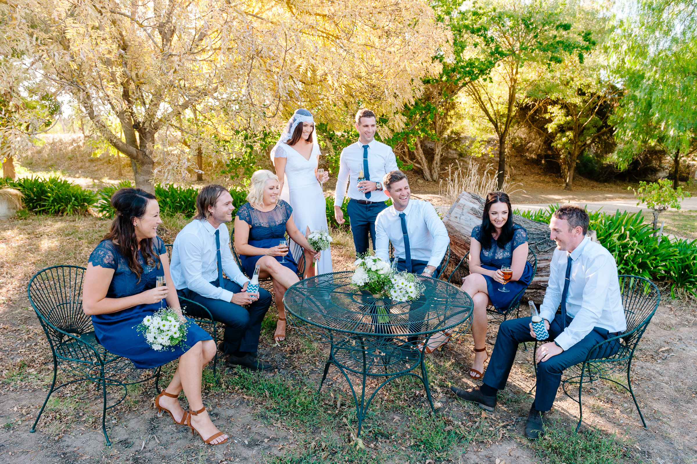 Bridal Party relaxing outside at Chateau Dore winery, Bendigo