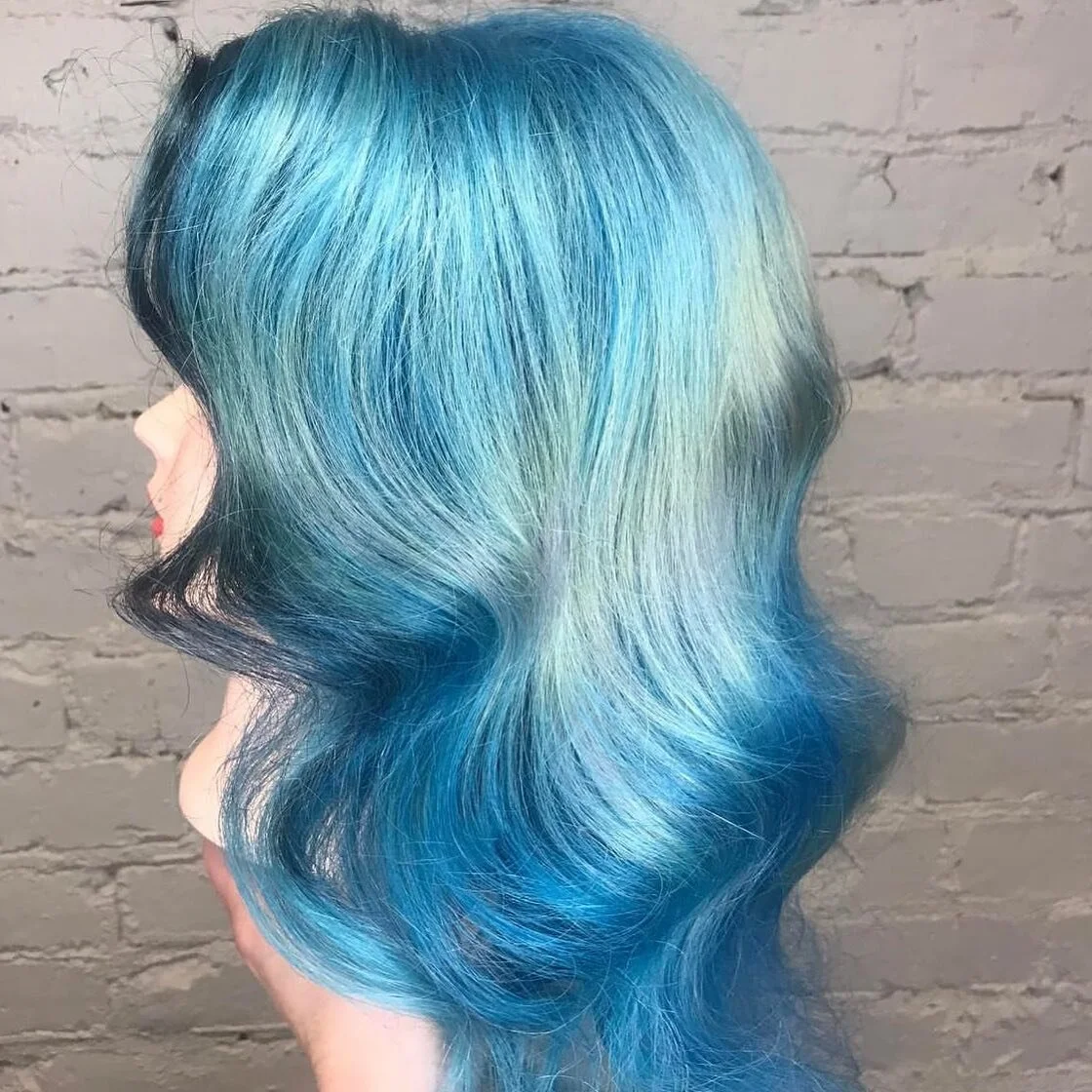 It&rsquo;s #mannequinmonday and we&rsquo;ve got some seriously gorgeous color for you. @elizabeth_at_vain worked her ocean magic on this fluid look. Interested in #mermaidmonday ? Come and see Elizabeth @vaincapitolhill 
.
.
.
#vainbeautyworld #vainc