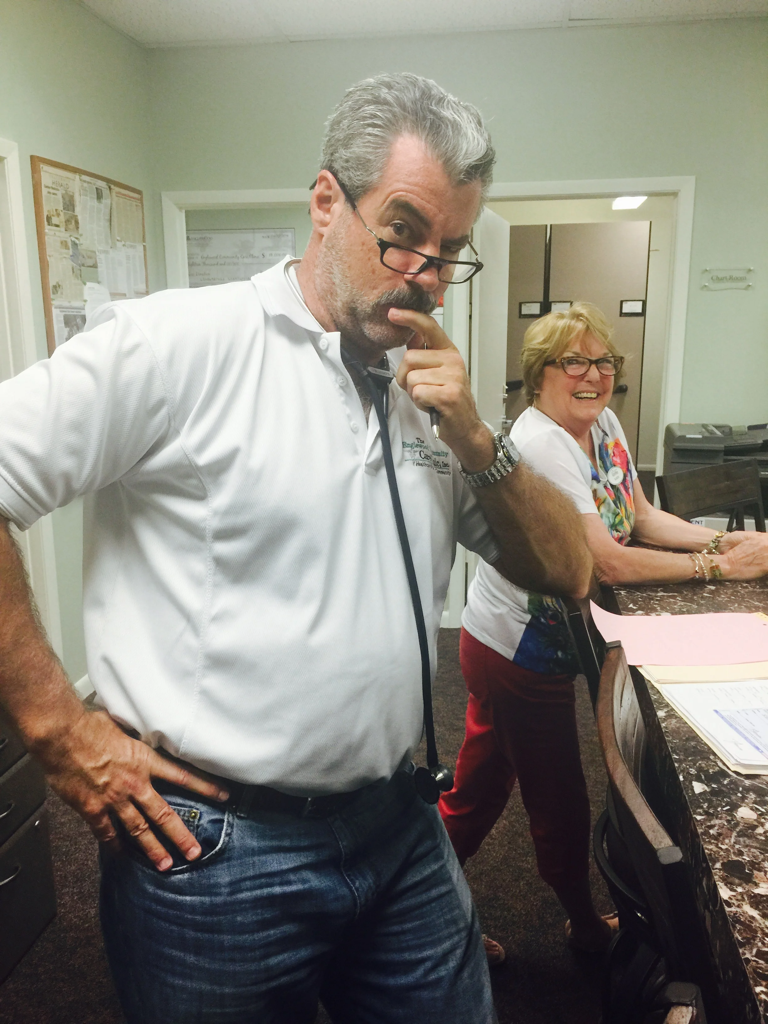 Dr. Ray is "very serious." Having fun at the clinic