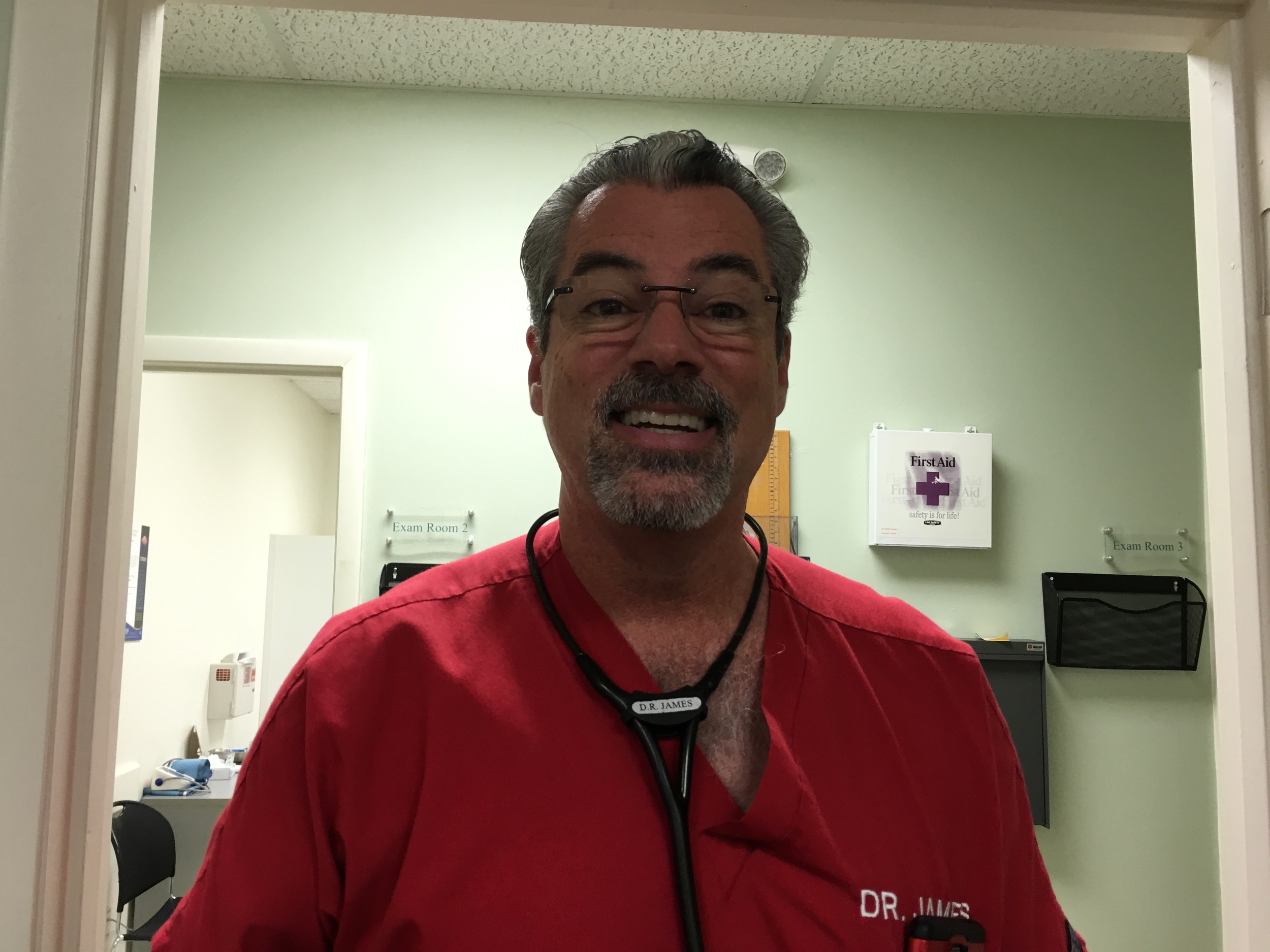 Dr. Ray James having fun while taking care of patients