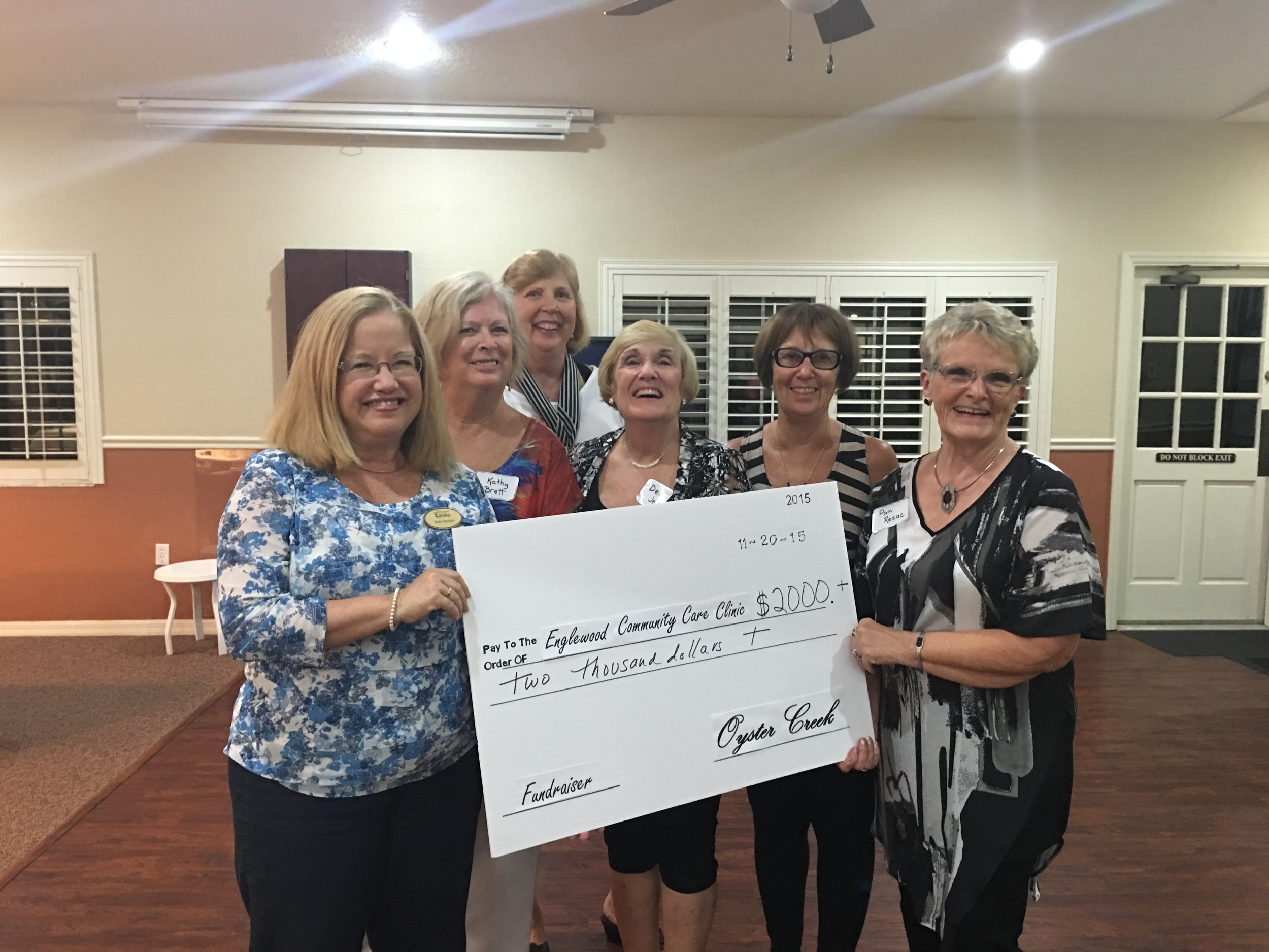Executive Director Beth Harrison and volunteers Kathy, Terri, Deb, Jan, and Pam celebrate an awesome donation from Oyster Creek