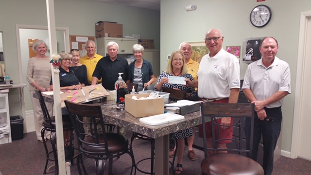 Executive Director Beth Harrison and the Board of the Plantation Community Foundation at the clinic