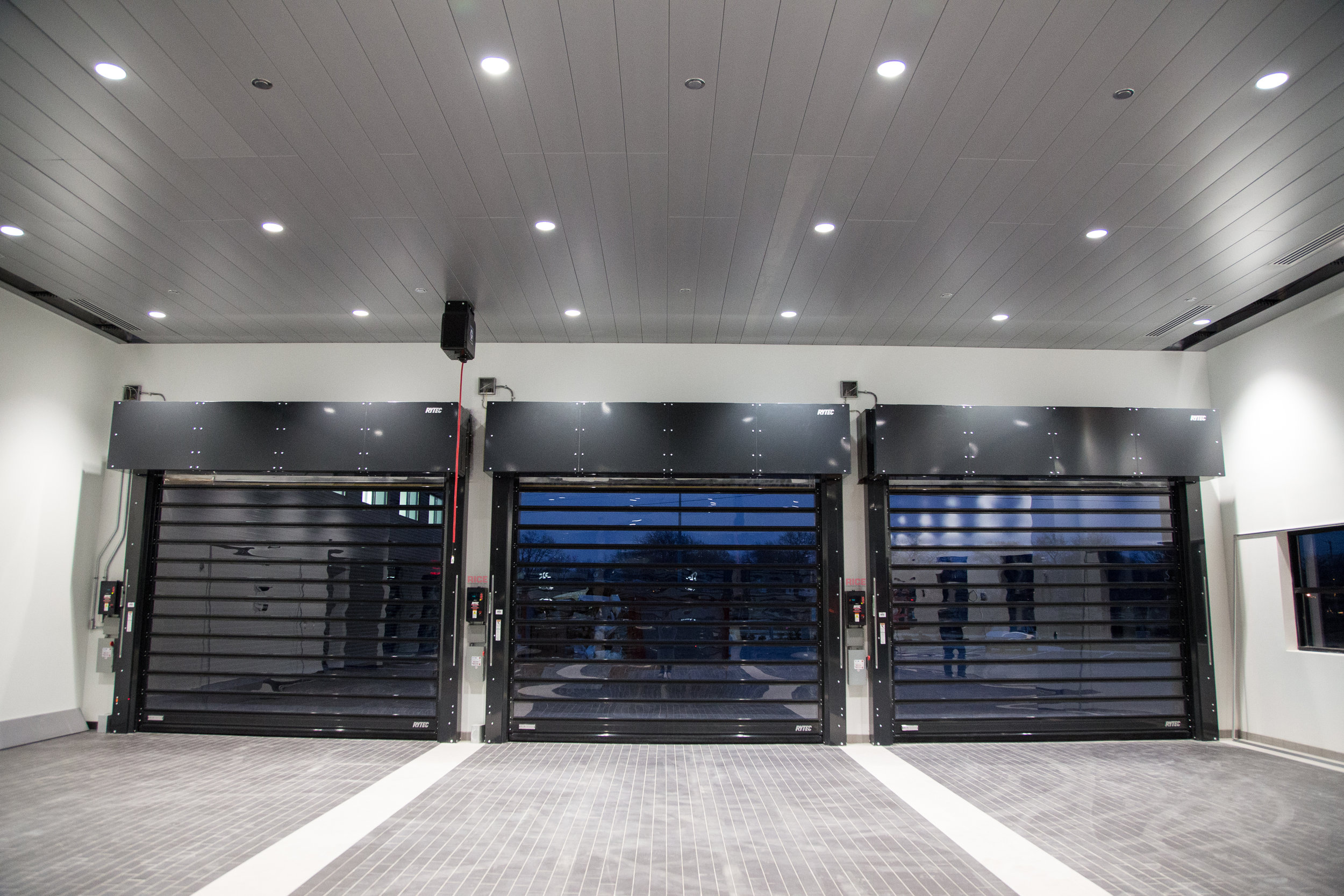 Porsche Dealership High Speed Doors St Louis Rytec Rice Equipment Loading Dock and Door Repair Zip Doors Super Fast Rolling Doors Quick Roll Doors Dealership Doors How Much Do High Speed Doors Cost.jpg