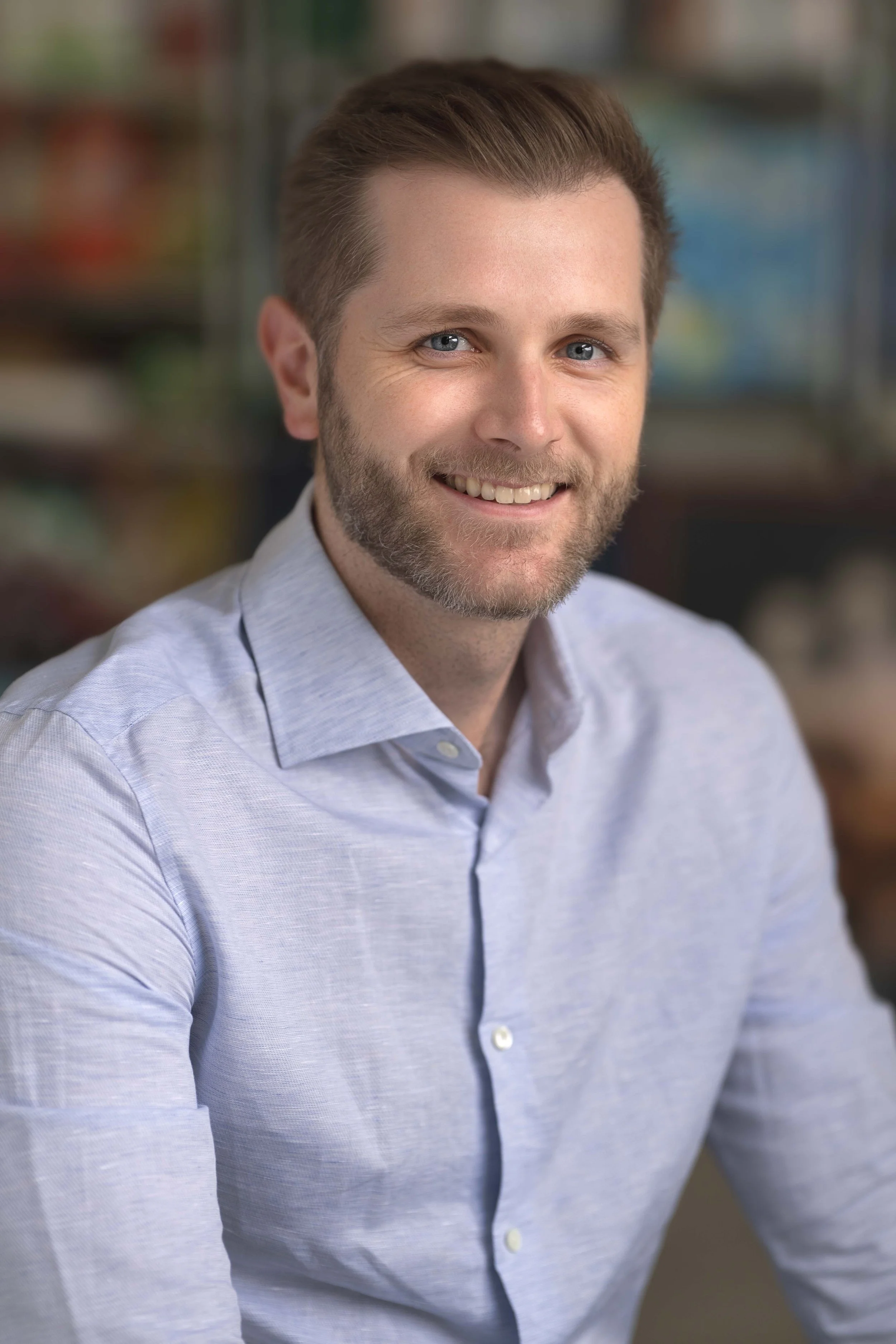 Confident, natural executive headshot of an established professional, Portland Oregon