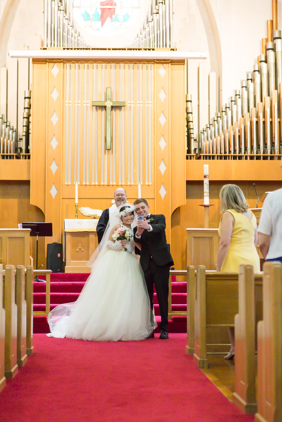 A quick "selfie" after the I do's