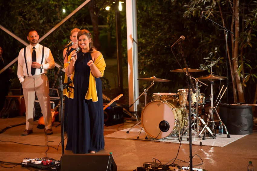 Maid of honor toasting couple at Nashville Zoo