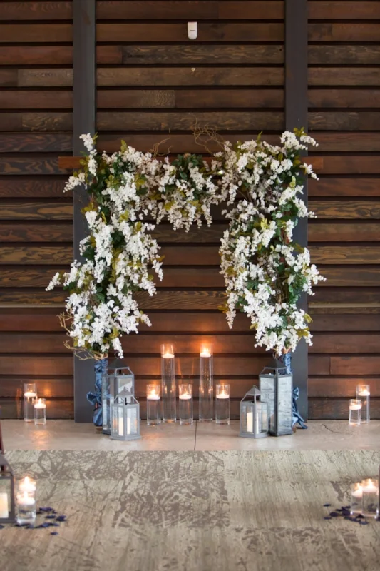Flowers, lanterns and candles. That is a great combination for this beautiful wedding at Nelson Andrews Leadership Lodge in Nashville.