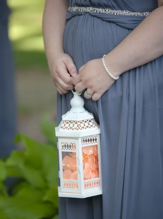 Flower pedals and led lights with the lantern are a great option to flowers for your bridesmaids.