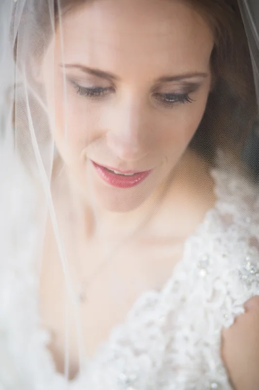 On the wedding day, we like to take a few moments alone with the Bride before she gets married. Once the dress is on, makeup applied, hair perfect and veil in place, it is a great opportunity for her to relax and just breathe for a moment and we can capture exquisite Bridal Portraits like this one.
